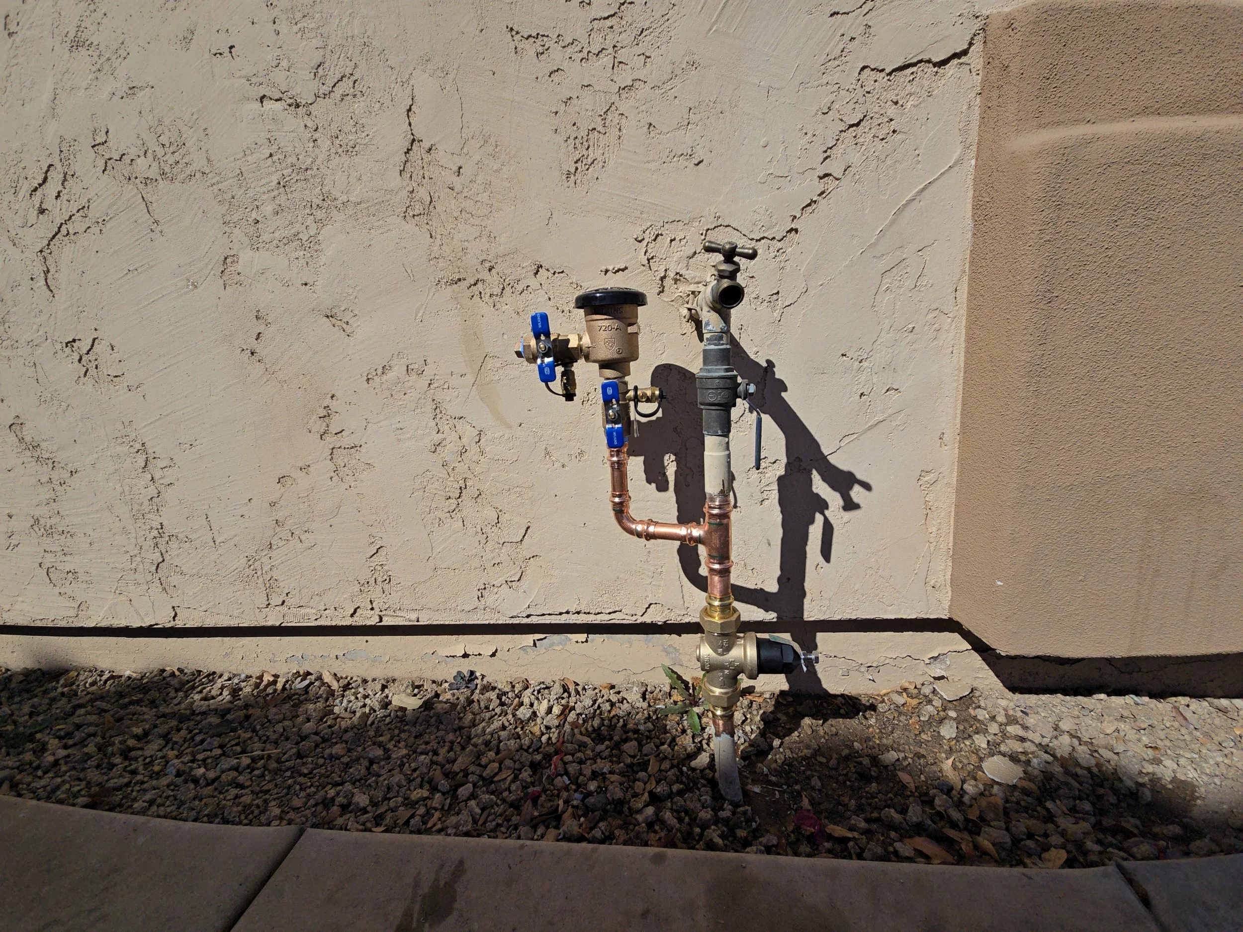 We added a new pressure regulating valve and a pressure vacuum breaker for future irrigation installation at a home in Glendale, AZ