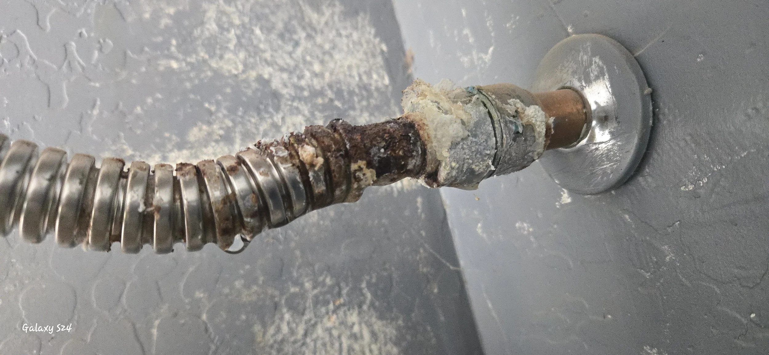 A home in Buckeye had a leak near their water heater. The supply line had been leaking for a long time and had crazy build up. We replaced it and resolved the issue. 