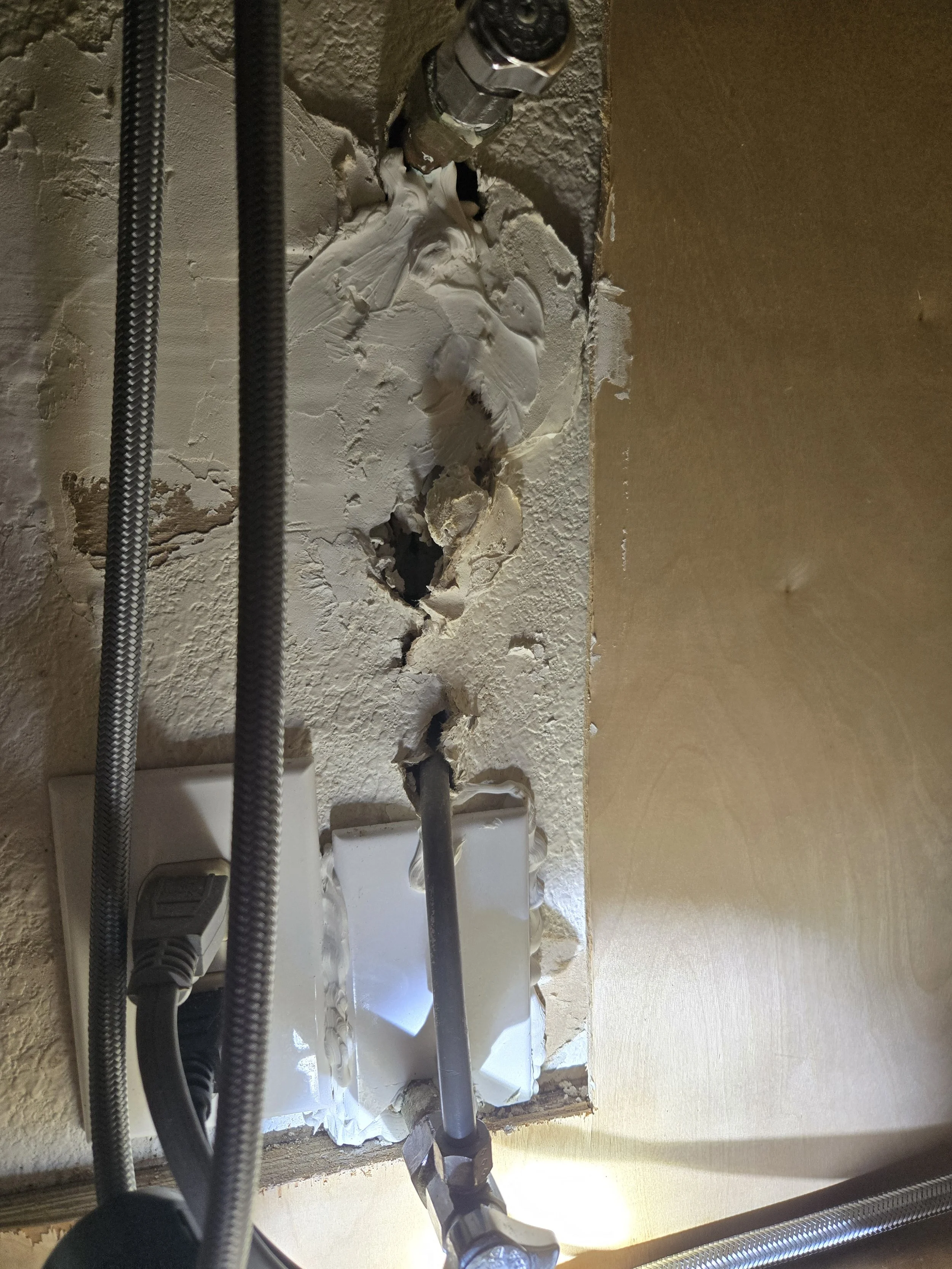 This ice maker line in Gilbert was run terribly and had developed a leak in the wall. We fixed it right and got them taken care of.