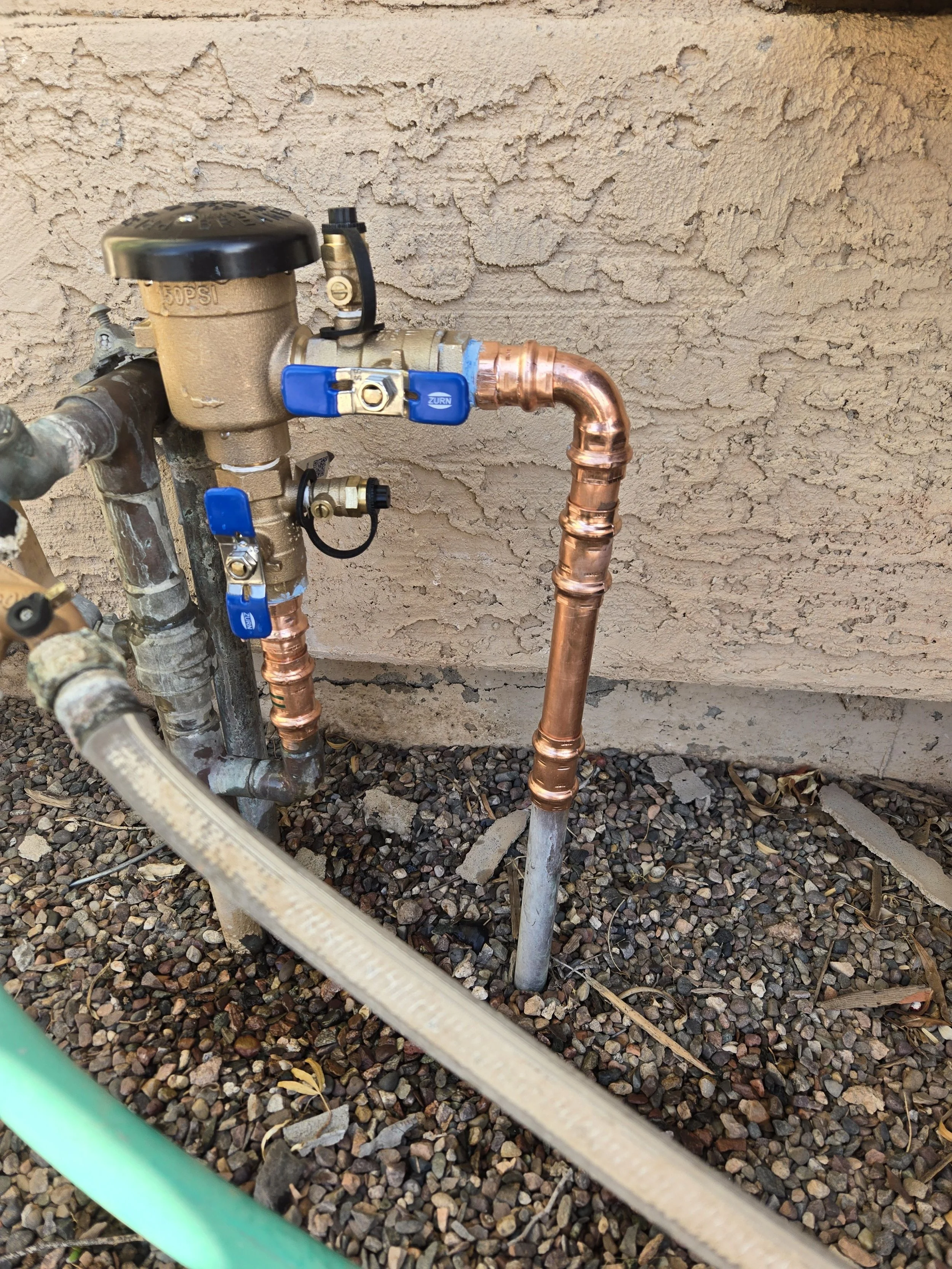 A new pressure vacuum breaker installed at a home in Glendale, AZ