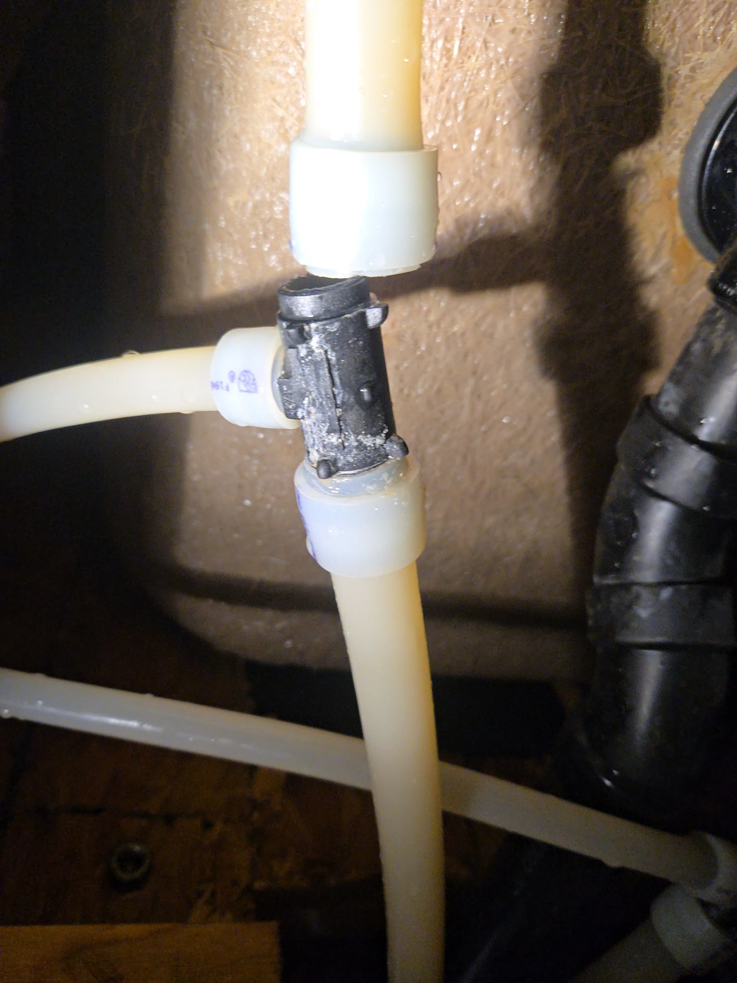 This PEX pipe fitting in San Tan Valley broke and was leaking in the wall. We replaced it and got the water system functioning normally again. And best of all leak free. 