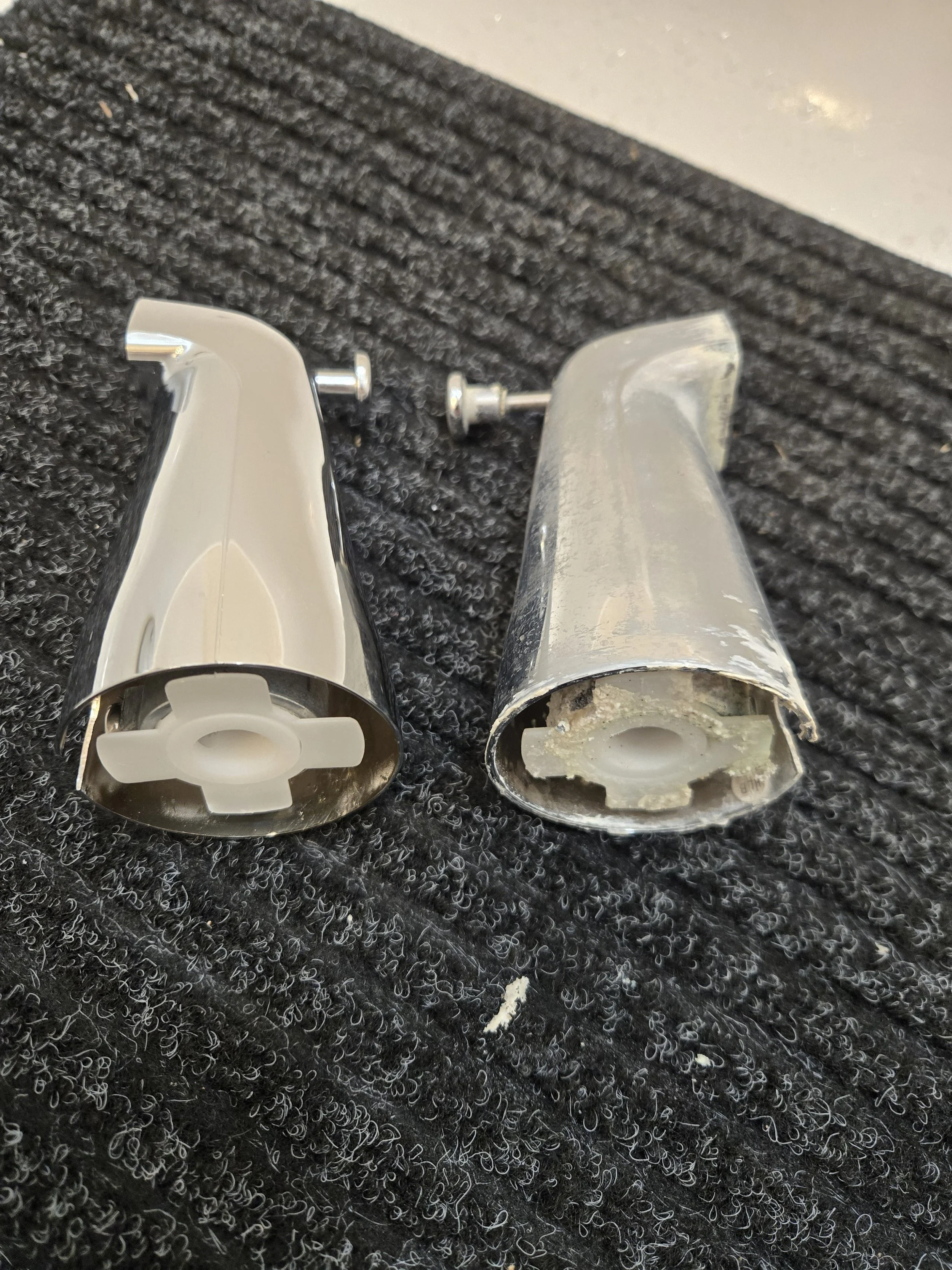 the old vs the new tub spout for a home in Mesa, AZ