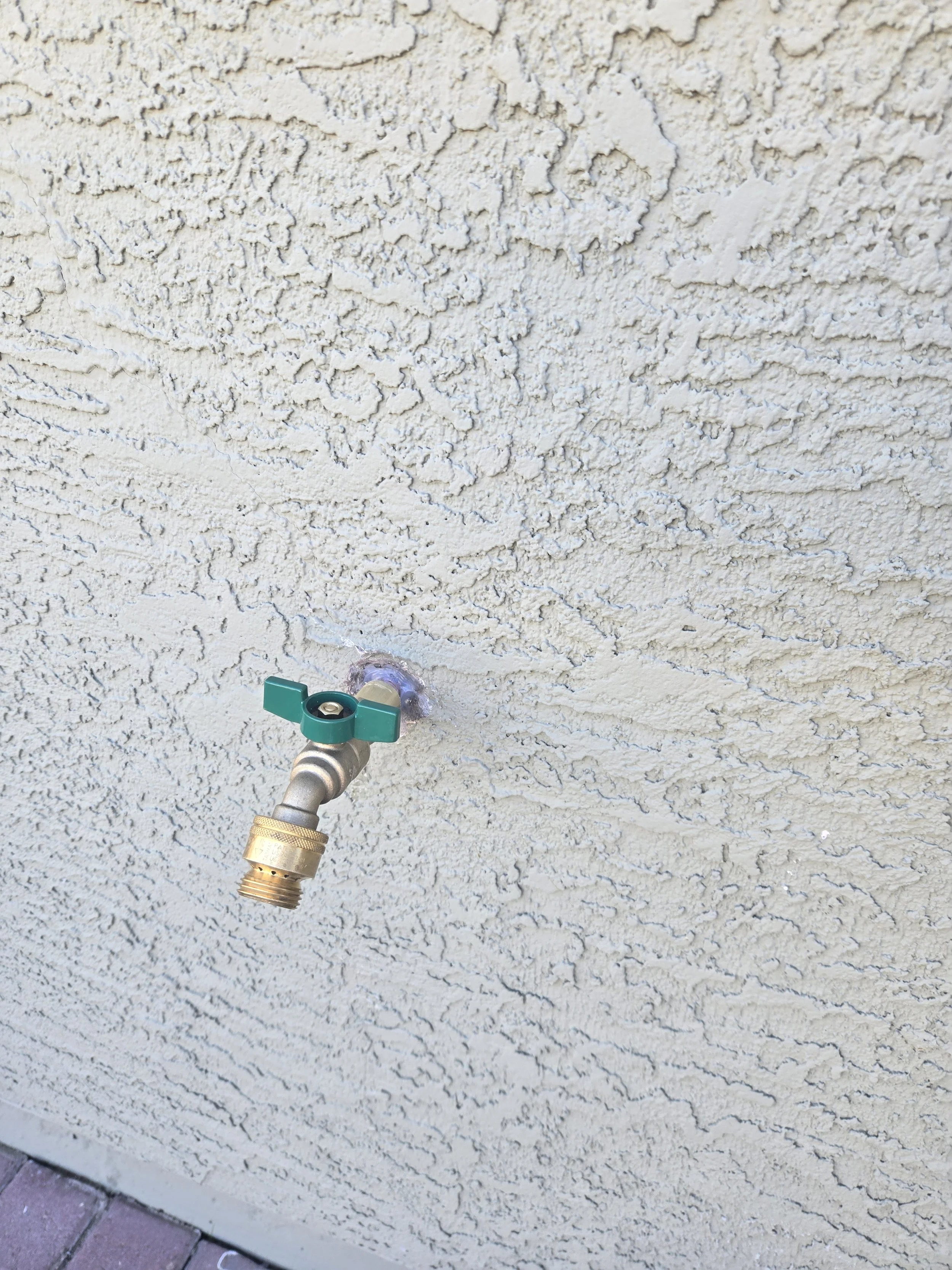 A new hose bib installed at a home in Glendale, AZ
