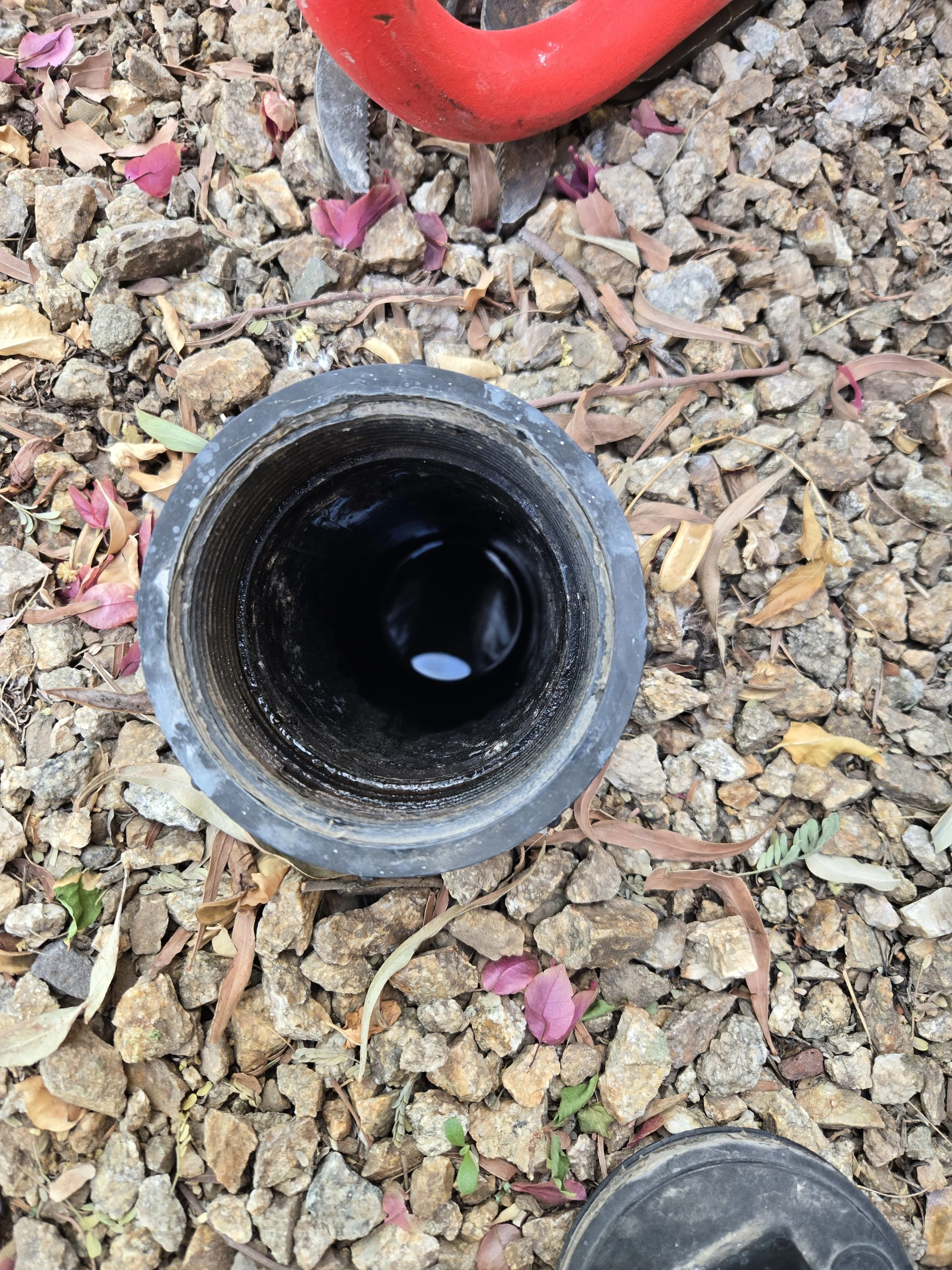 A clogged sewer clean out that we cabled and cleared. 