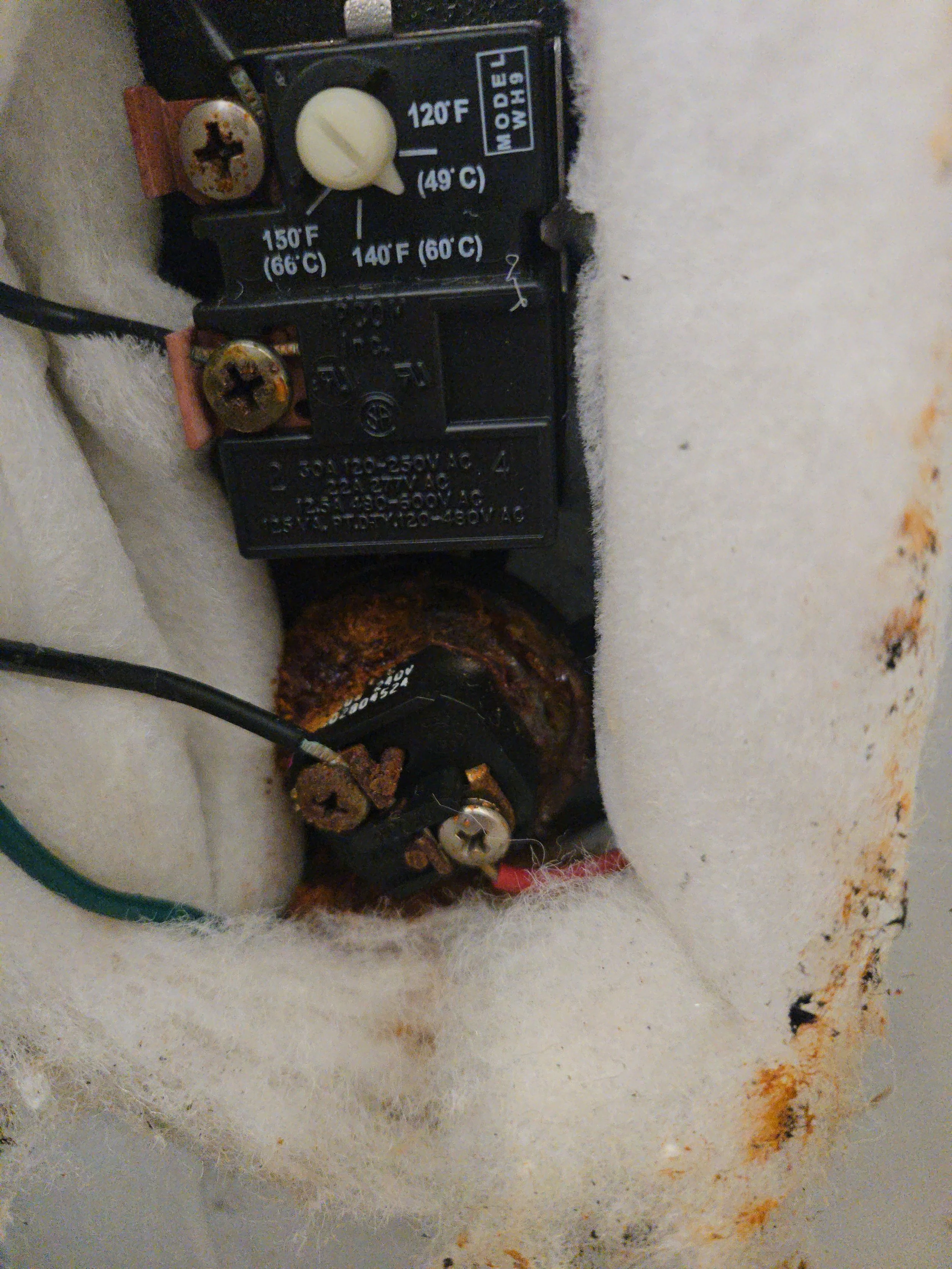 A bad lower element and thermostat for an electric water heater that we repaired at a home in Gilbert, AZ. 