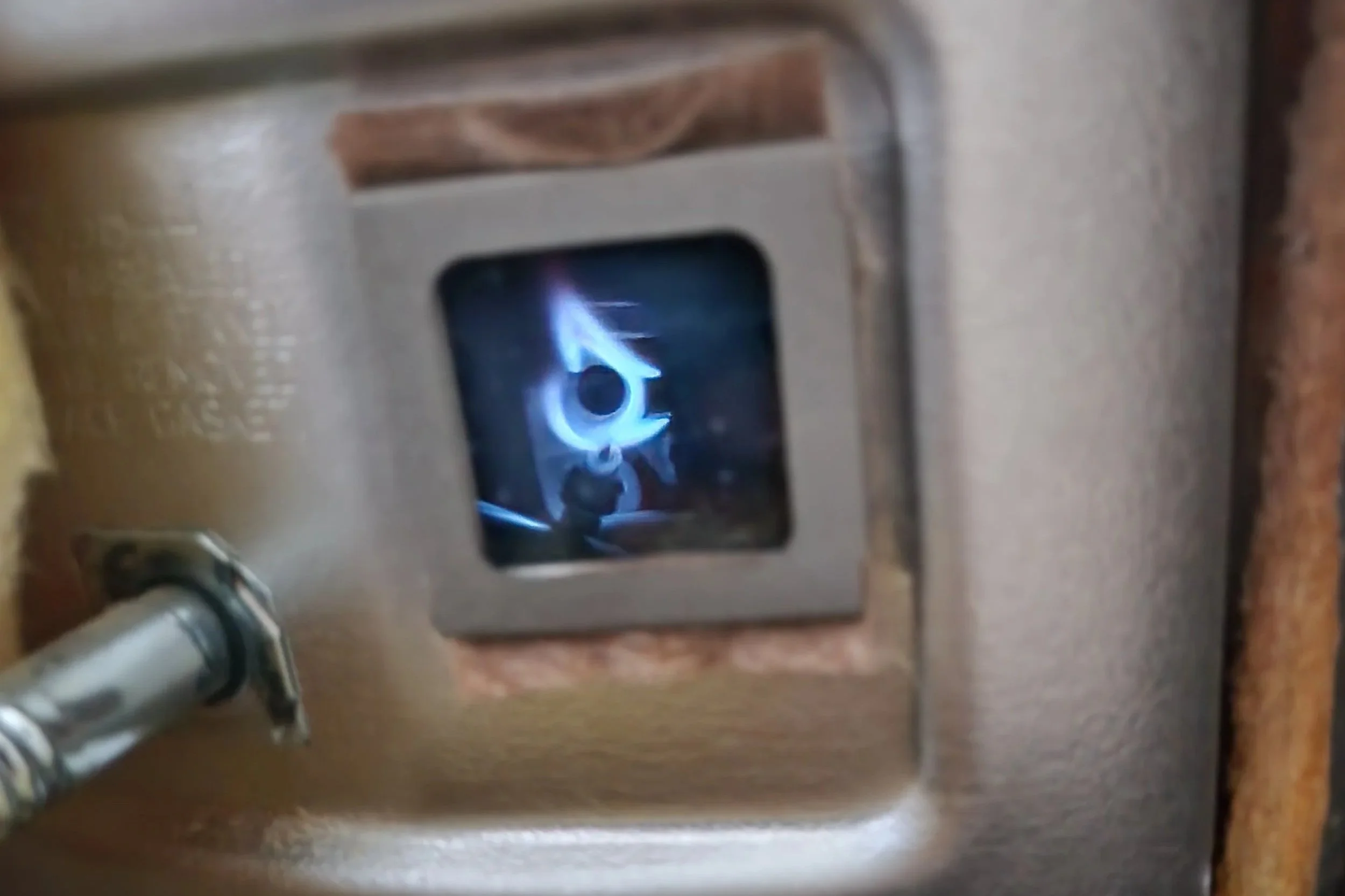 "Water heater pilot light burning blue in Phoenix, AZ home — Mountain Vista Plumbing"