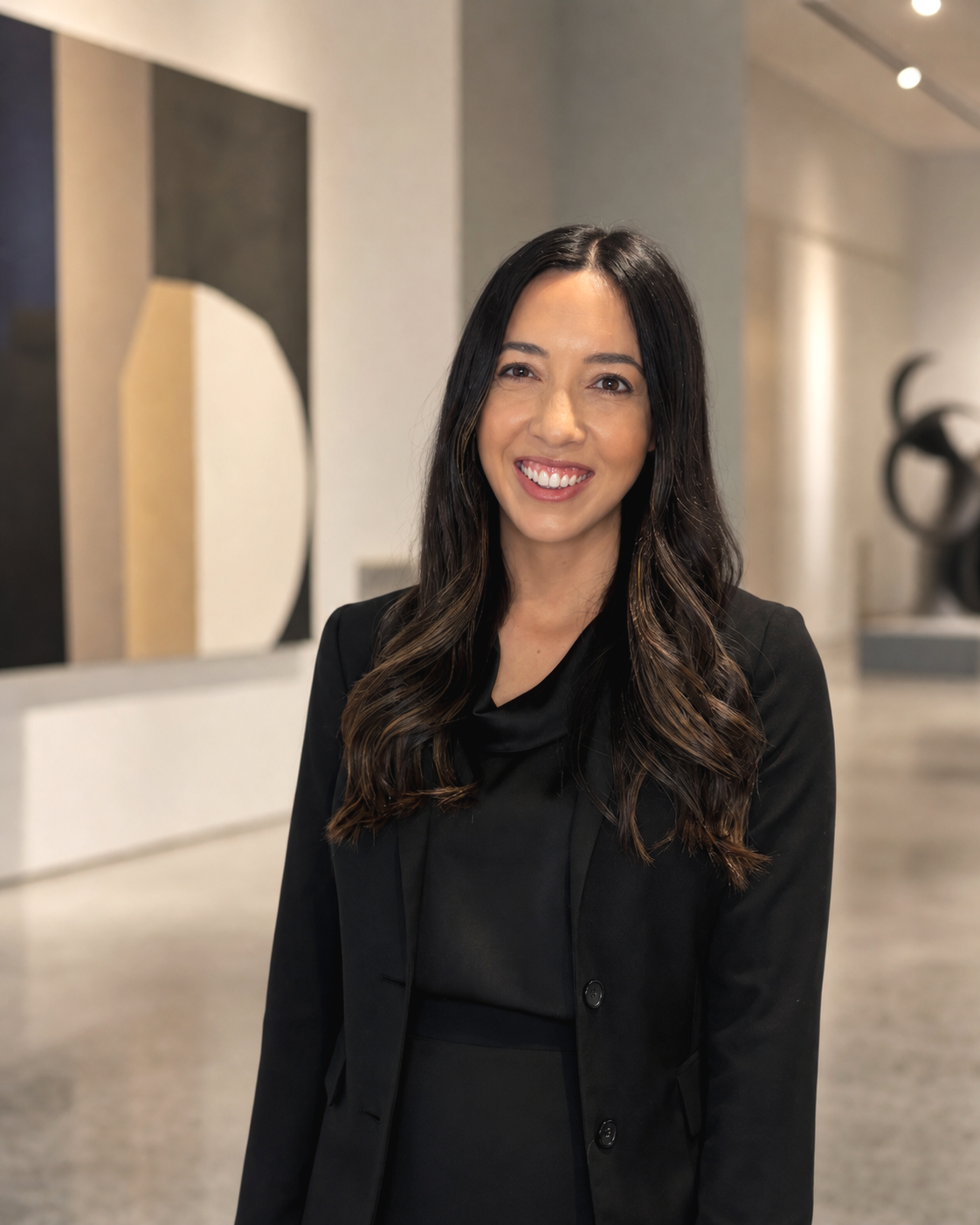 Attorney Shannon Nocon appearing in a modern art museum.