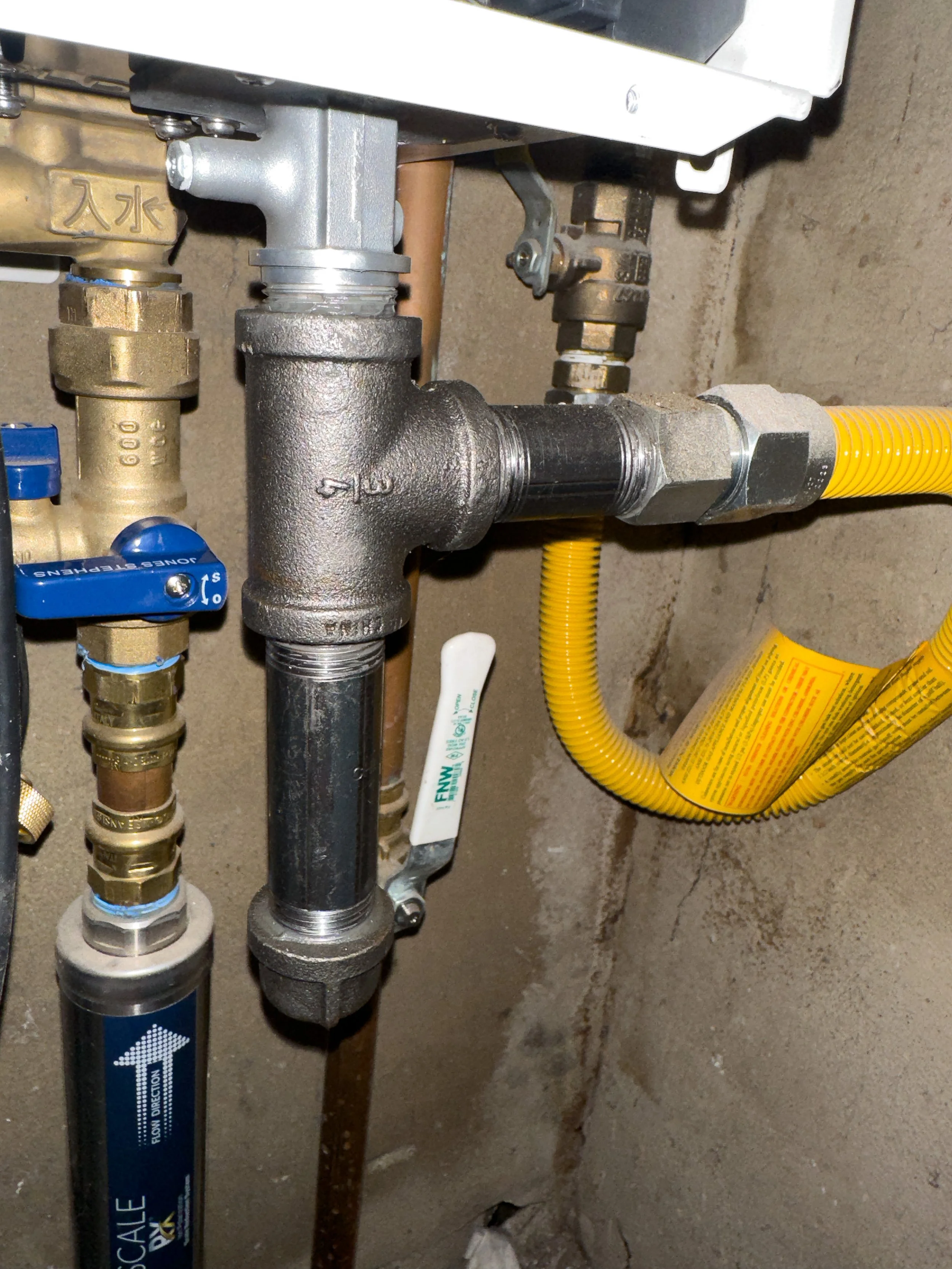 Gas sediment trap for tankless water heater installed by Premier Flow Plumbing in Pasadena, CA.
