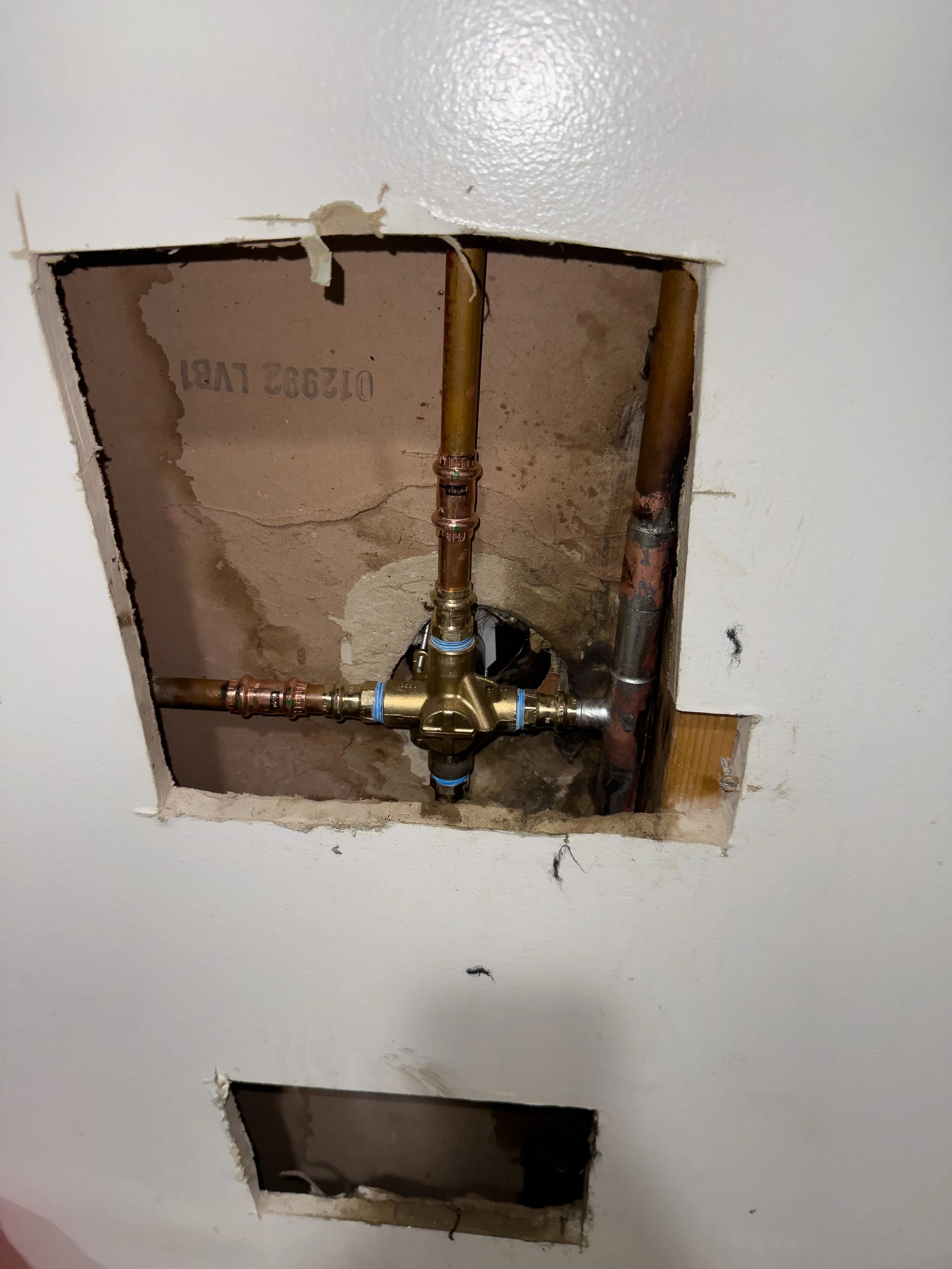 Shower valve installation in Los Angeles, CA.