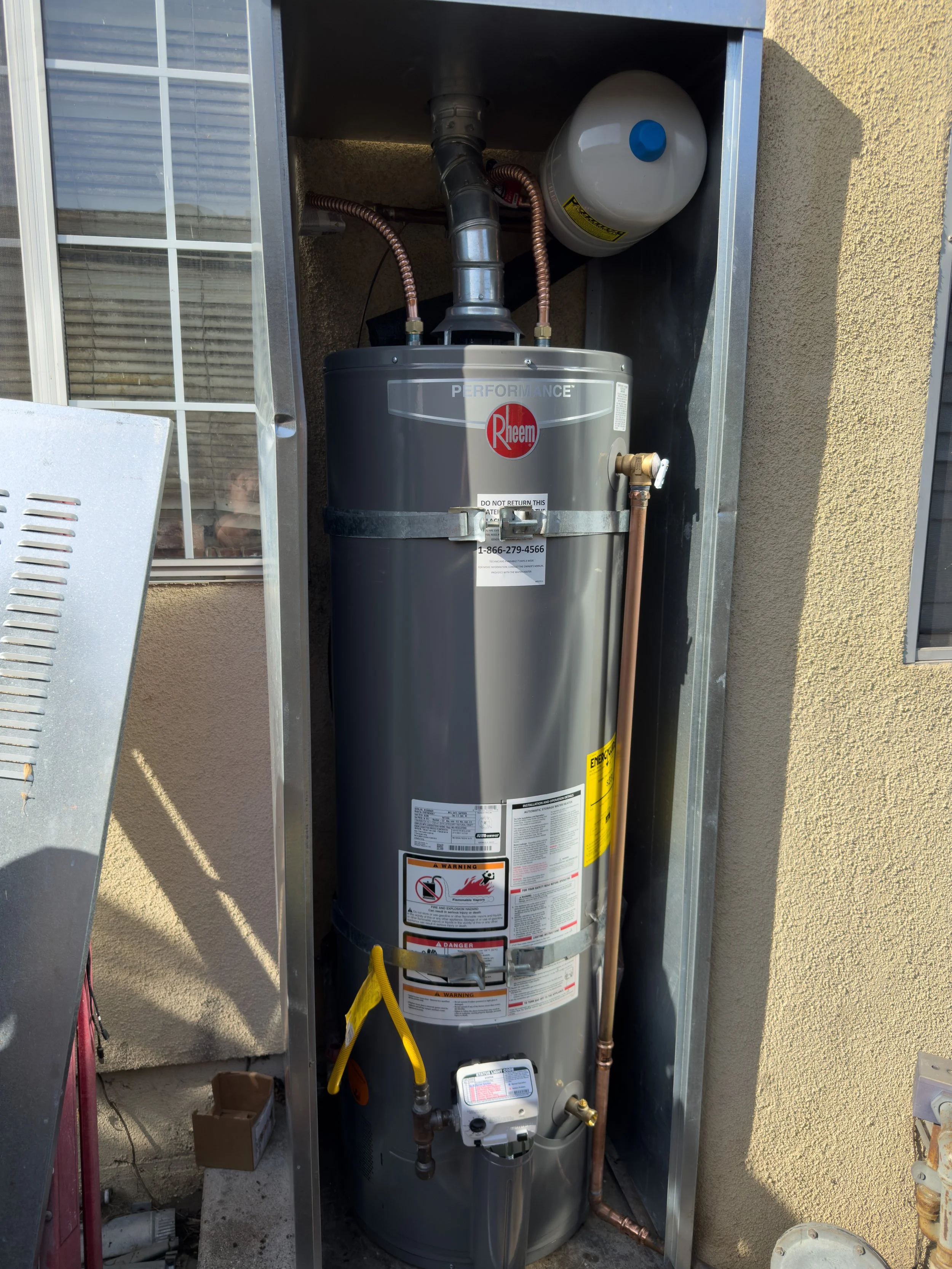 Rheem conventional water heater installation by Premier Flow Plumbing in El Monte, CA.