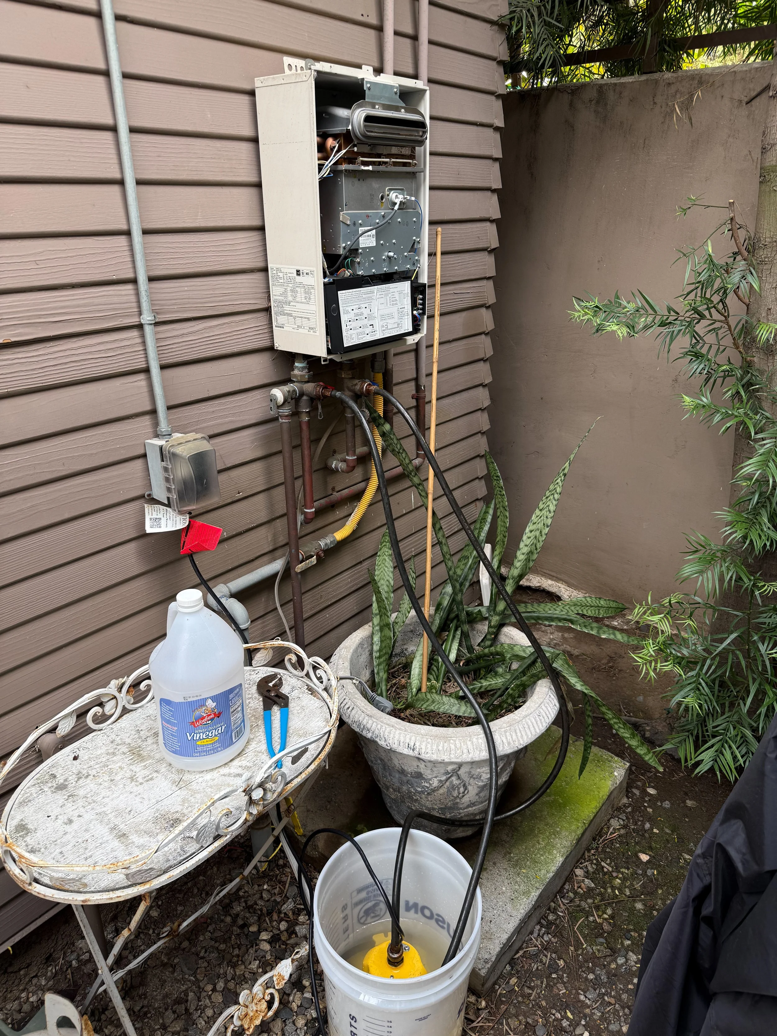 Tankless water heater descale by Premier Flow Plumbing in Los Angeles, CA