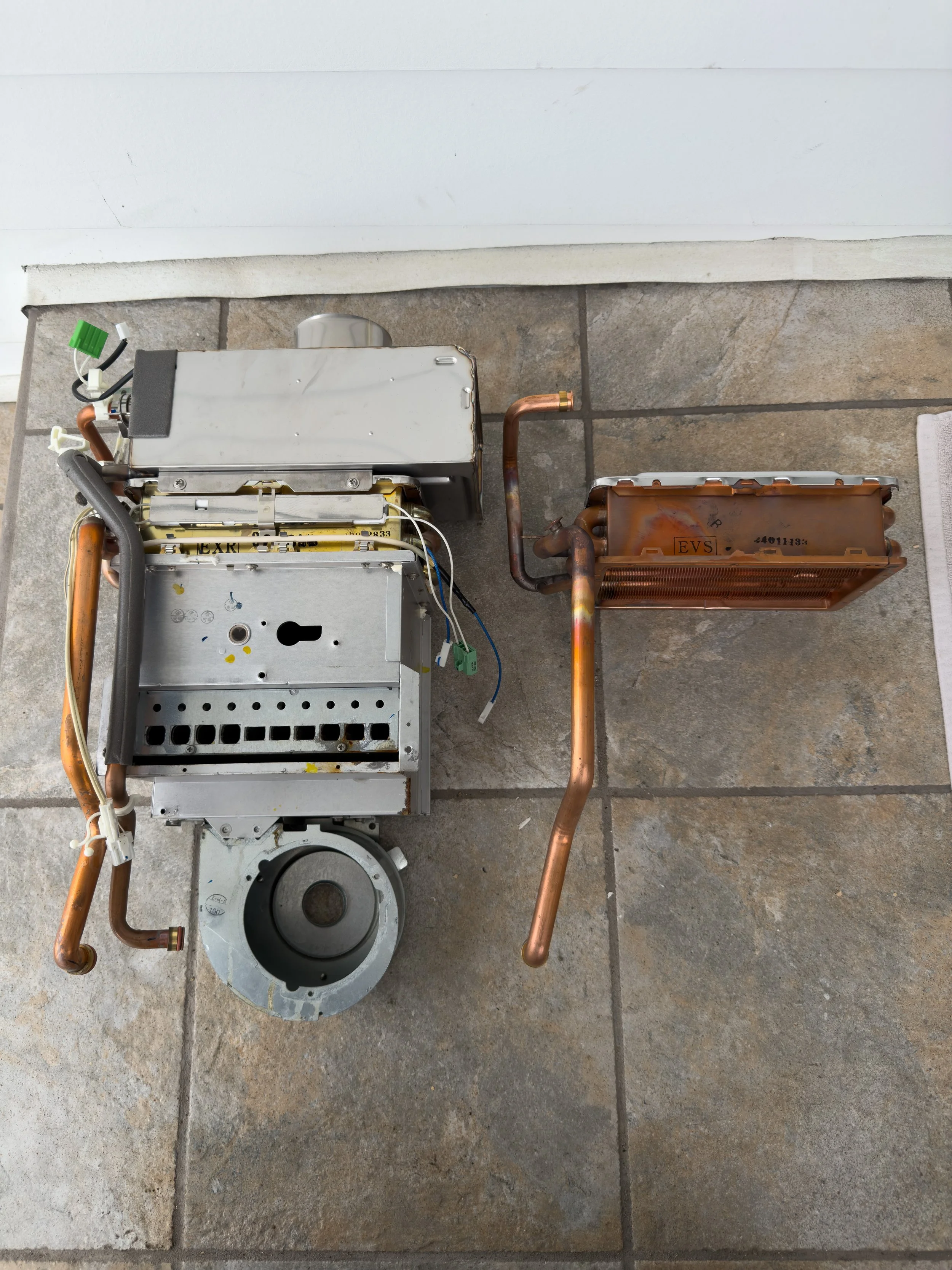 Noritz tankless water heater heat excnhager replacement in Hermosa Beach, CA.