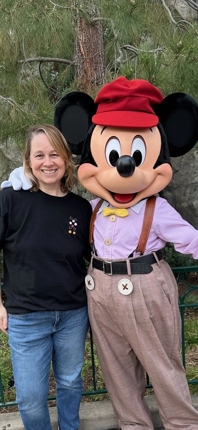Smiling with Mickey Mouse at Disney California Adventure—one of my happiest moments.
mickey mouse, character meet and greet, disneyland, dca