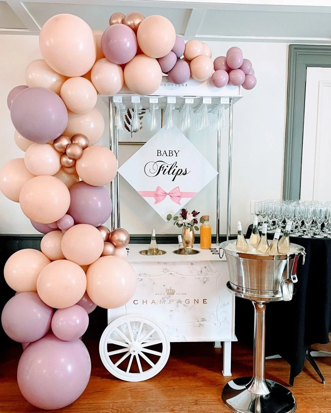 The kind of setup that instantly sets the tone ✨🤍

Soft tones, a statement balloon install, and a champagne bar that&rsquo;s just as pretty as it is functional&mdash;this is how you elevate a baby shower into something unforgettable 🥂 Every detail 