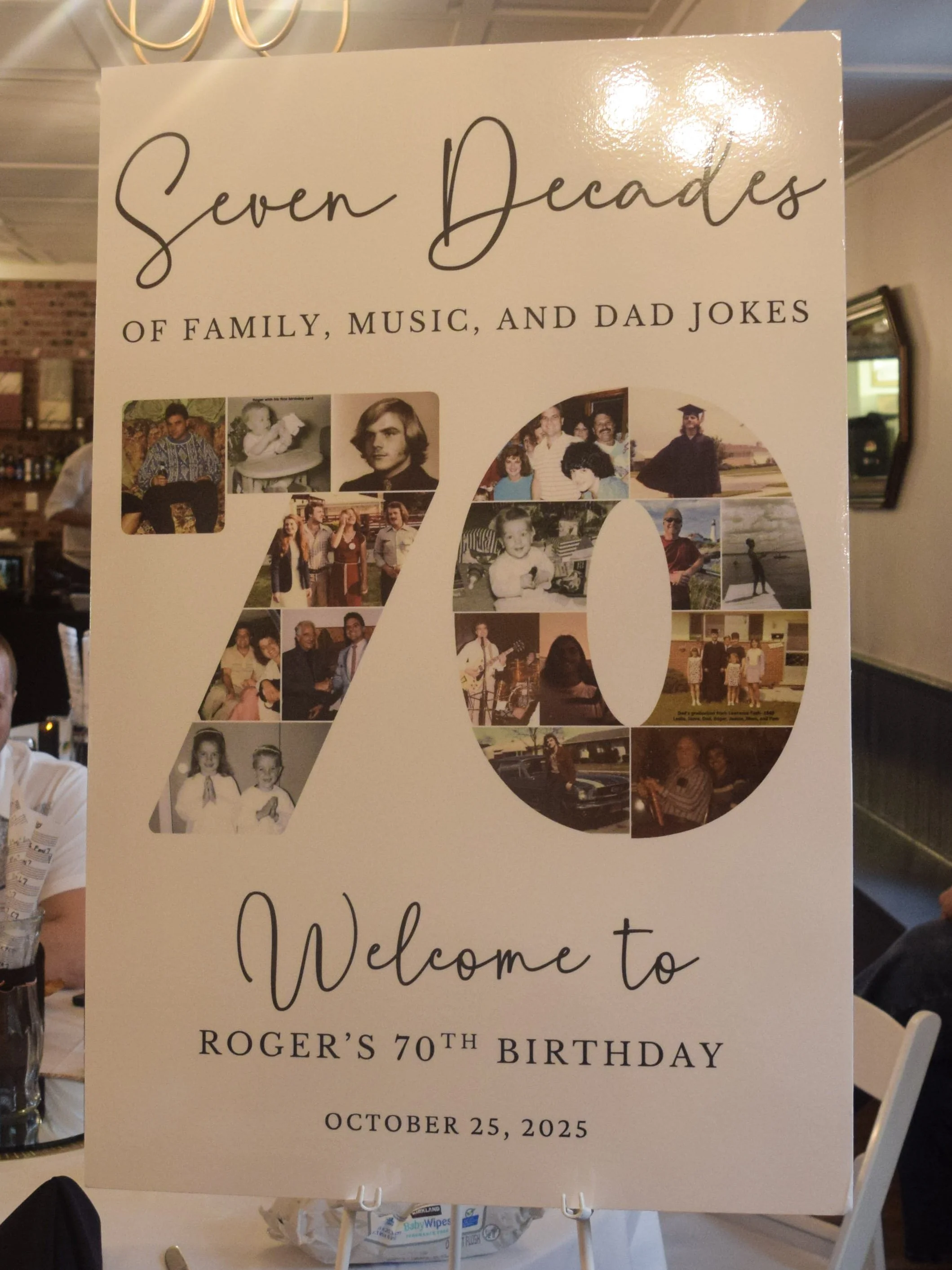 A large celebration poster with the number 70 made of photo collages, titled 'Seven Decades of Family, Music, and Dad Jokes,' celebrating Roger’s 70th birthday on October 25, 2025.