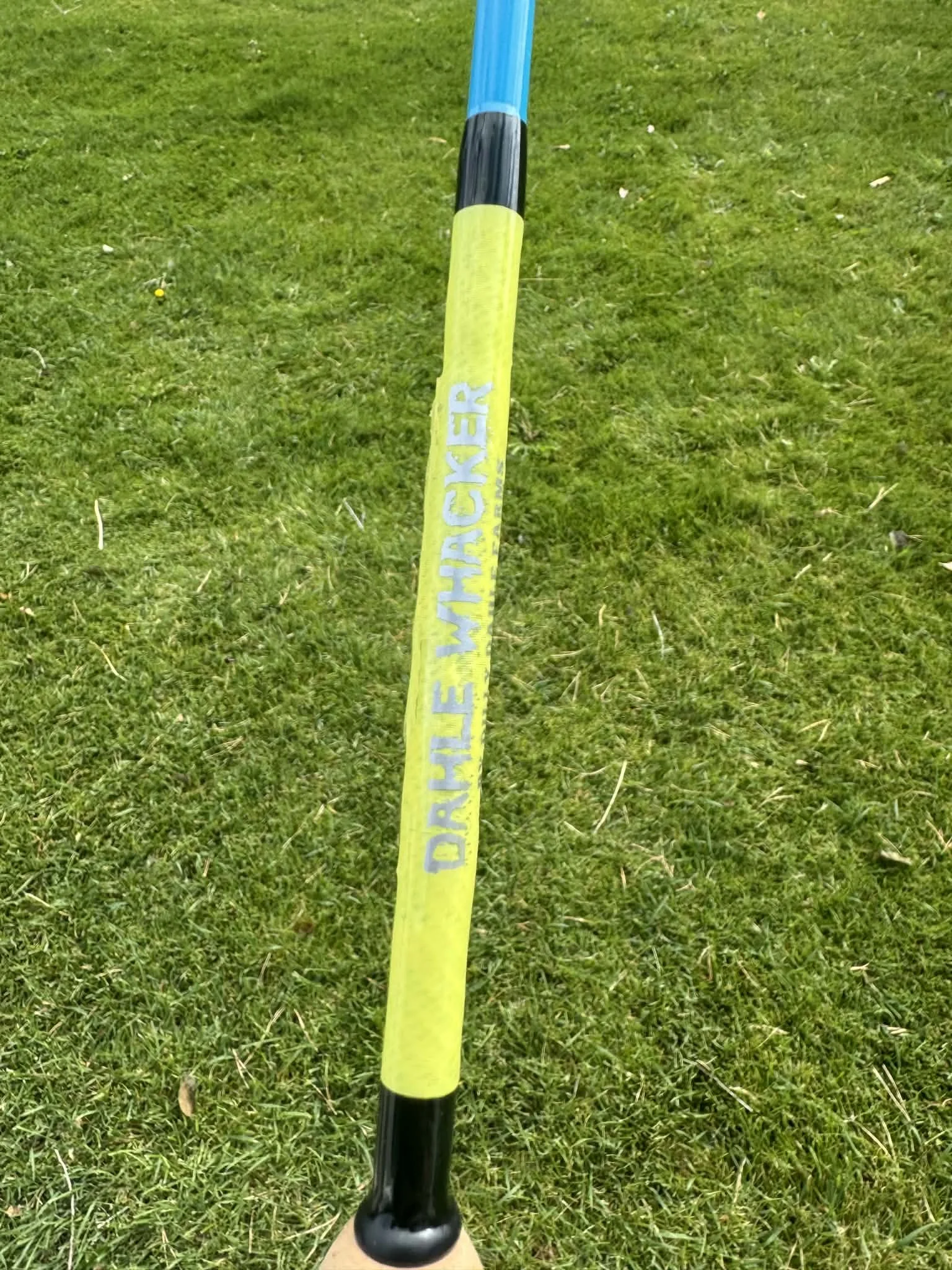 Custom fishing rods with handcrafted wraps and wooden handles built by Dilly Dahle Custom Rods in Preston, Idaho.