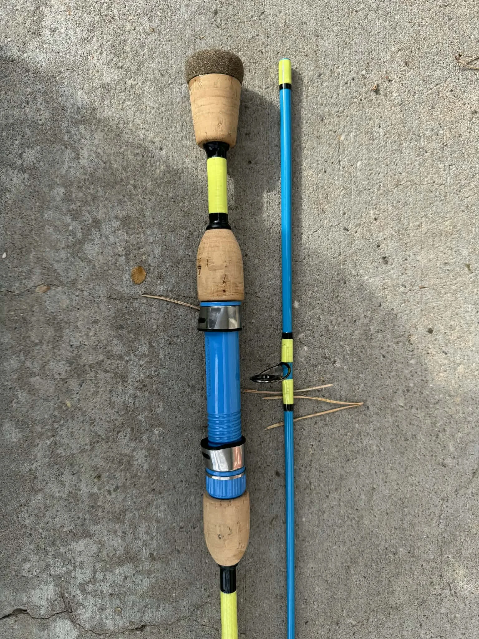 Custom fishing rods with handcrafted wraps and wooden handles built by Dilly Dahle Custom Rods in Preston, Idaho.