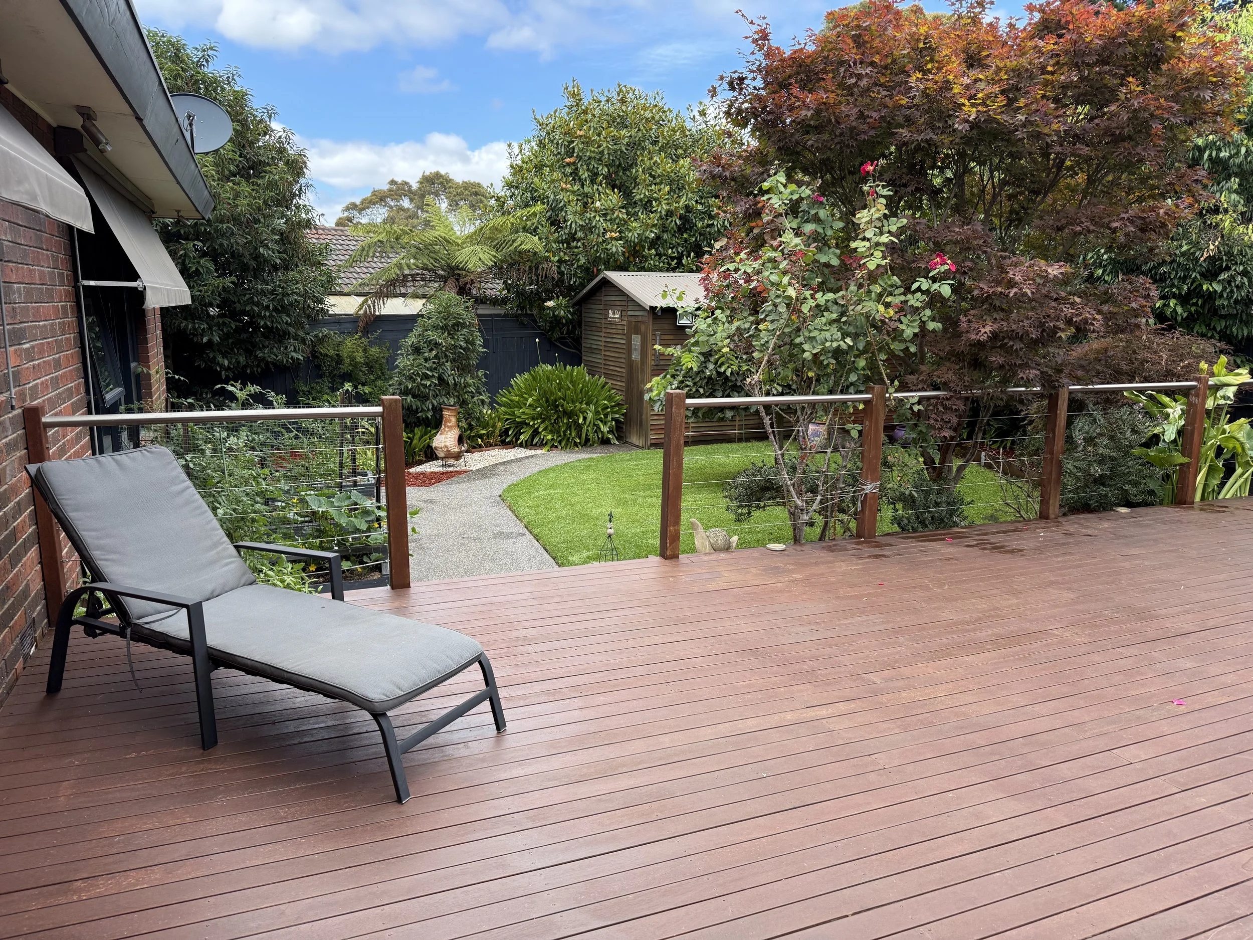 Pressure-washed timber deck and tidied garden, Vermont South