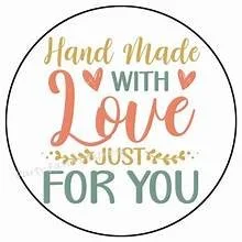 Circular design with the words 'Hand Made with Love Just for You' and small decorative hearts in gold, red, and green colors.