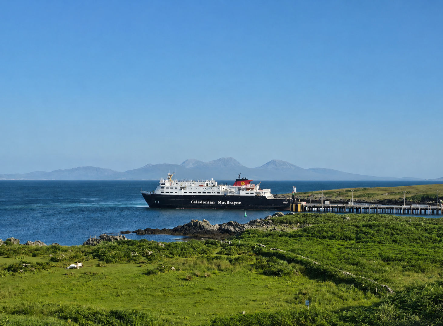 A Caledonian MacBrayne ferry arriving at the pier in Scalasaig