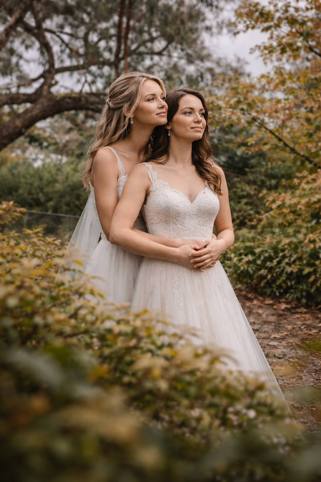 two beautiful brides having photos in the grounds of our garden at The Elopement House