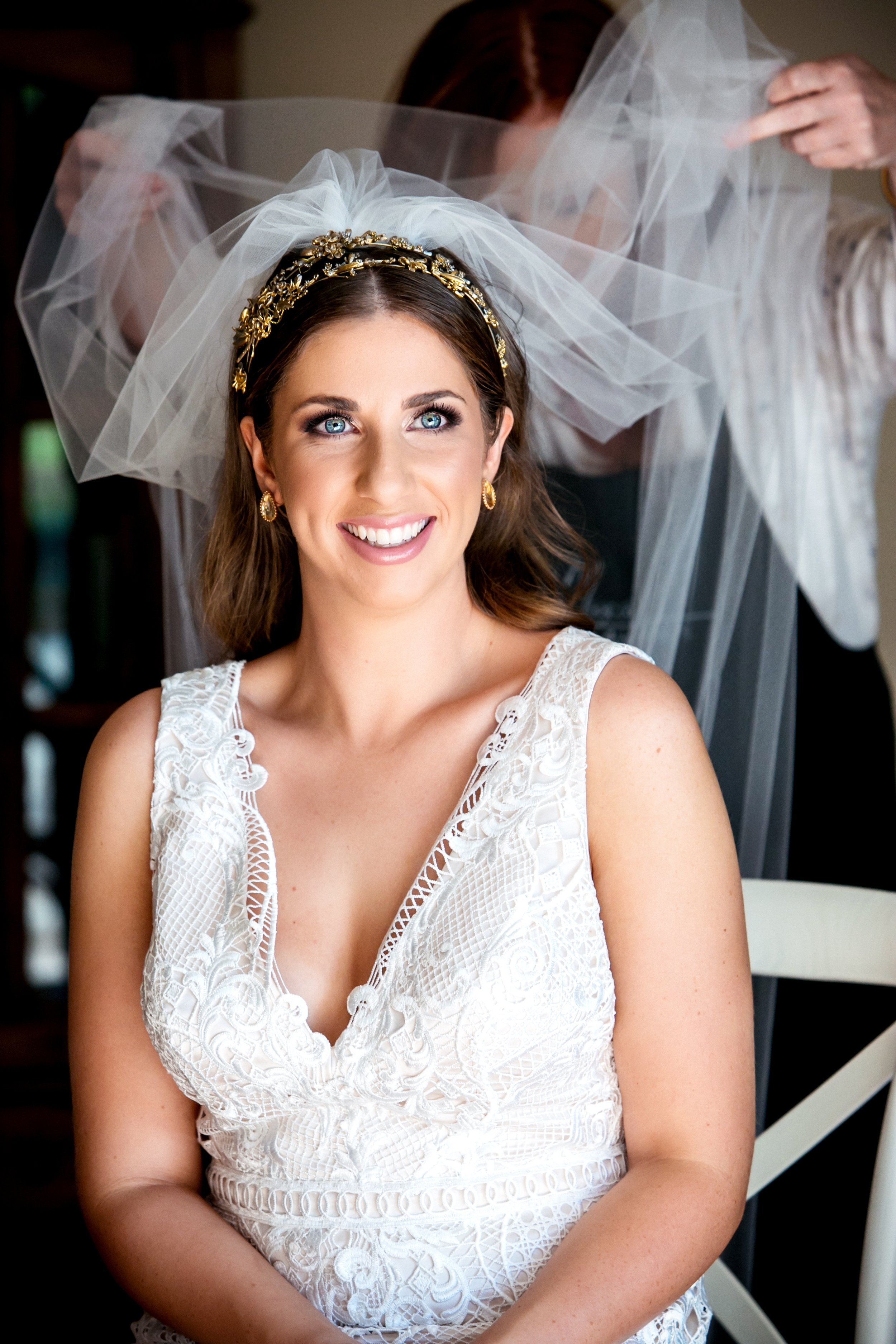 having the veil put on by Magical Makeovers staff