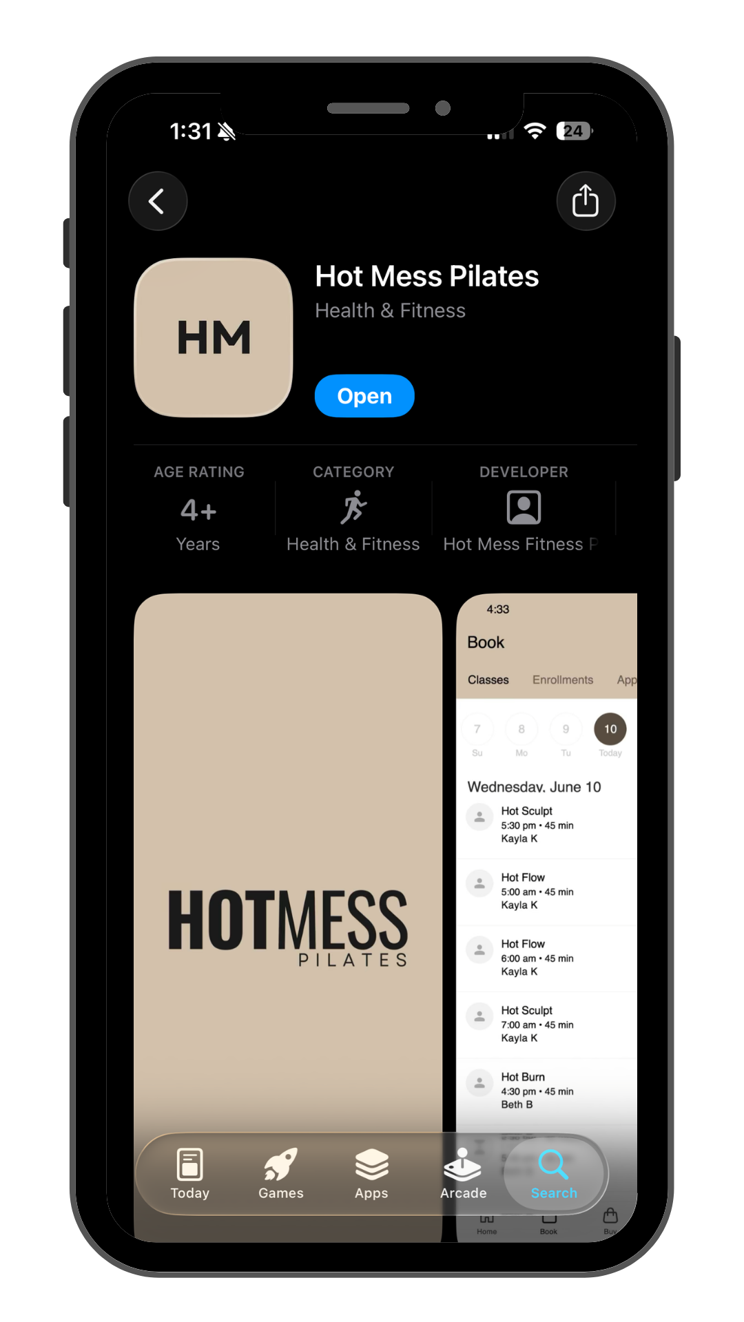 An iPhone screen displaying the Hot Mess Pilates app page with a beige logo featuring the initials 'HM' and the text 'HOT MESS PILATES'.