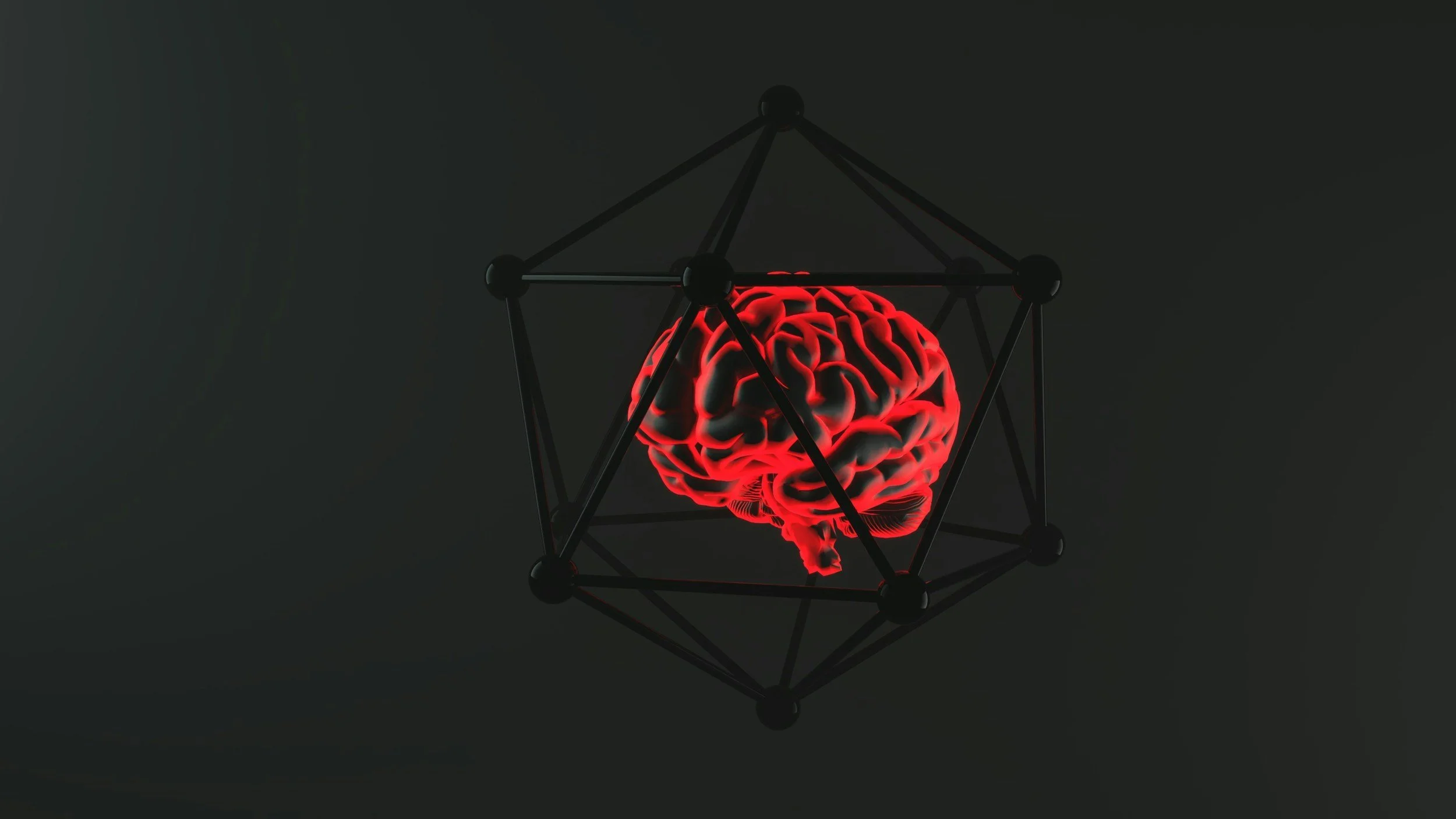 A digital illustration of a human brain glowing red inside a black geometric 3D structure against a dark background.