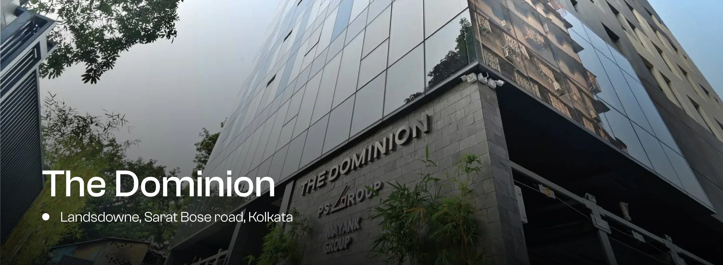 Investors inspecting a newly acquired commercial retail complex for leasing income.