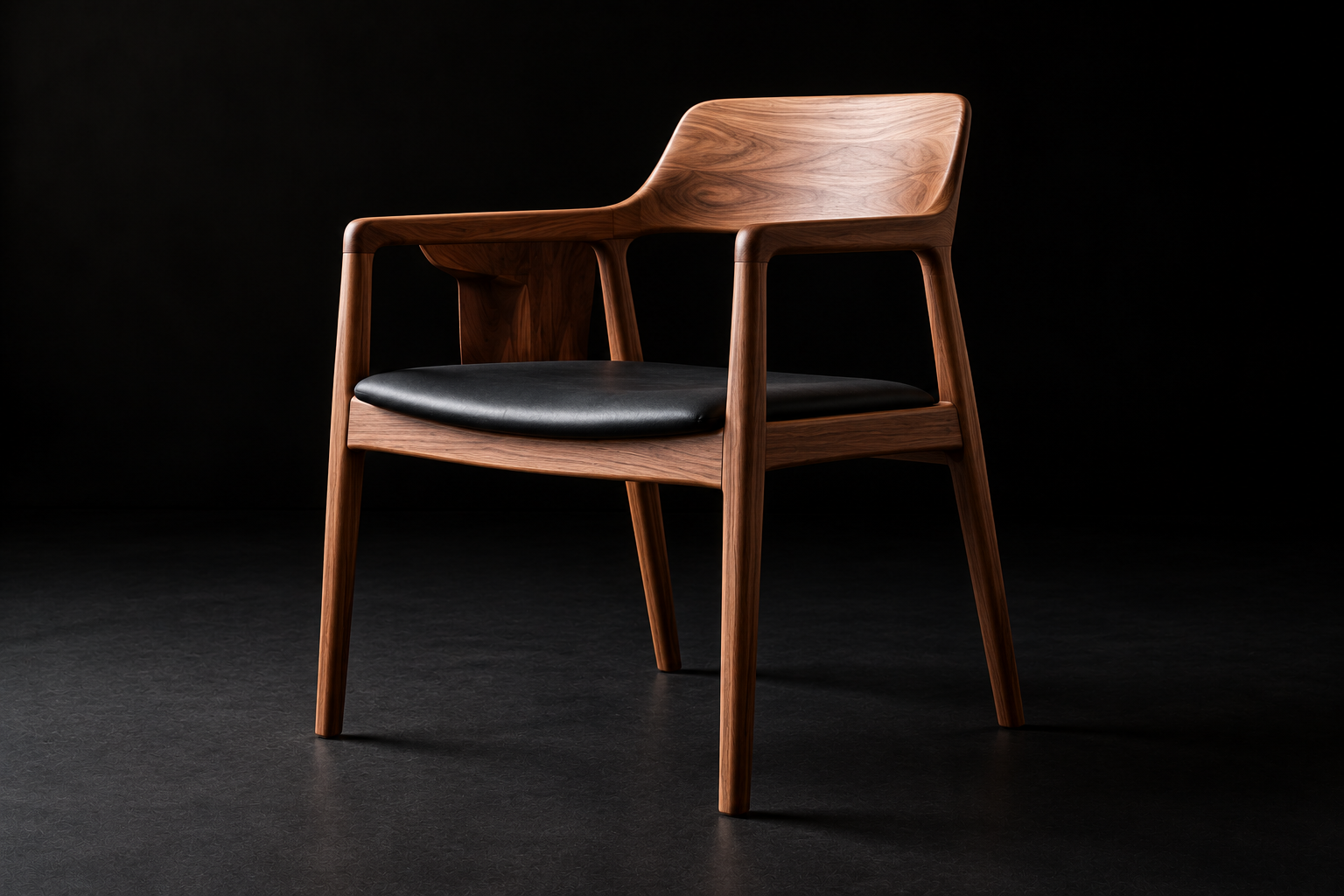 Wooden chair with black cushioned seat against a dark background.