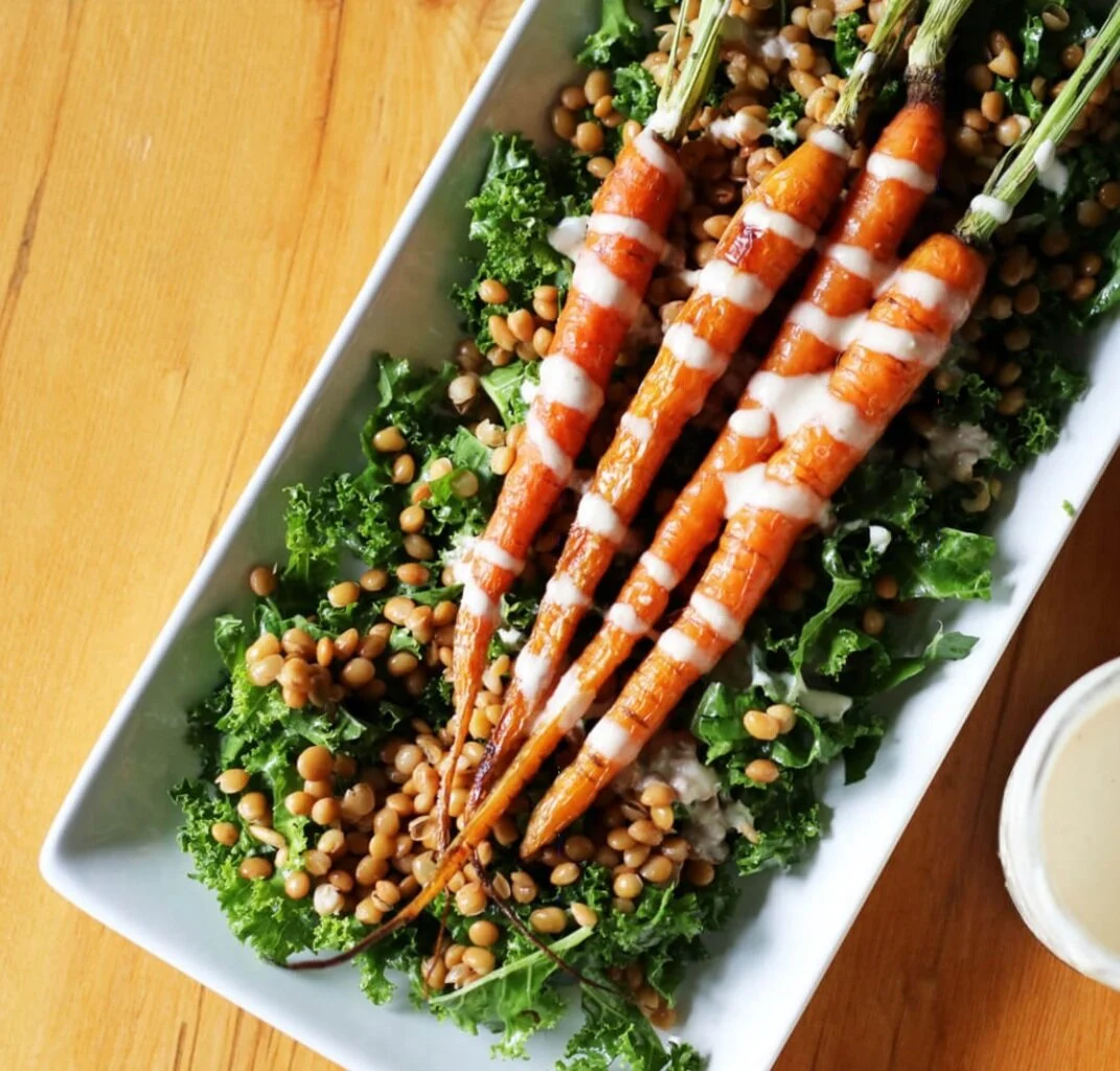 Roasted carrots with kale, lentils and tahini