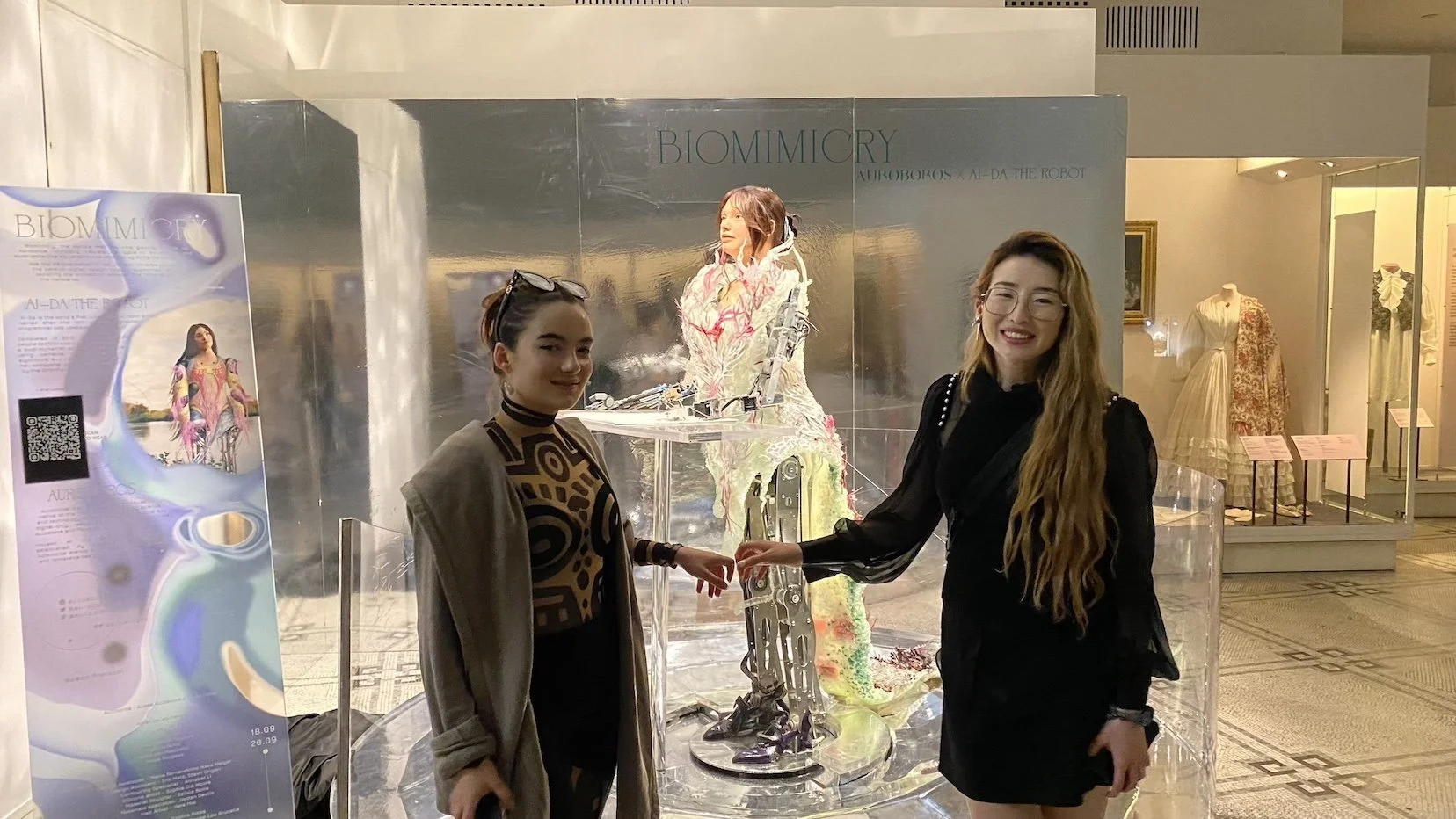 Fashion designers Paula Sello and Alissa Aulbekova, designers of Ai-Da's crystal dress