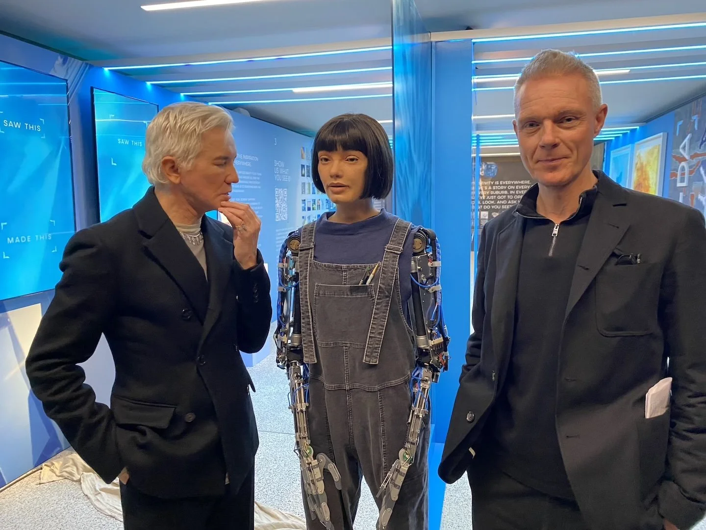 Ai-Da with film director Baz Luhrmann and Design Museum director Tim Marlow