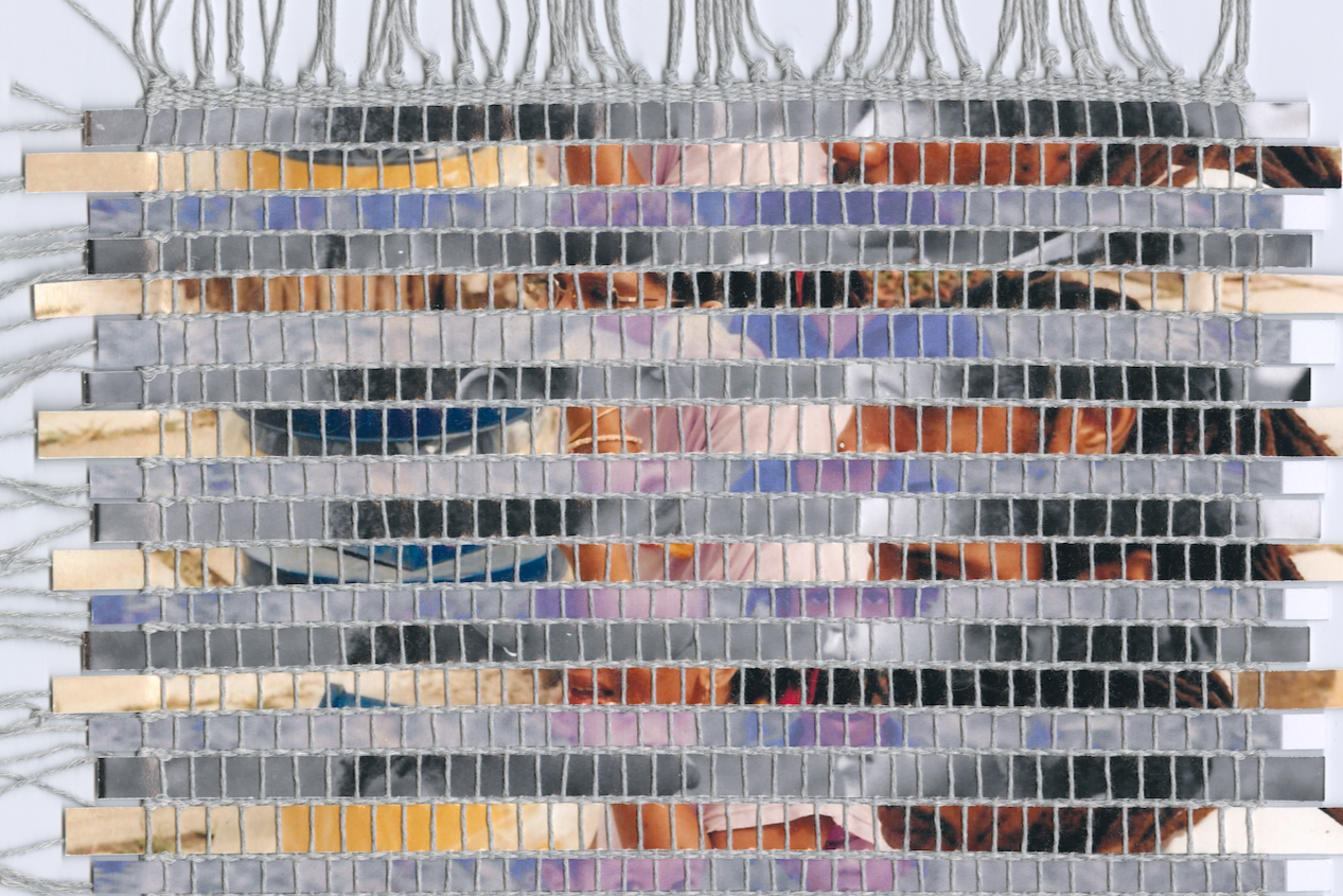 Mixed media weaving created using strips of family photographs.