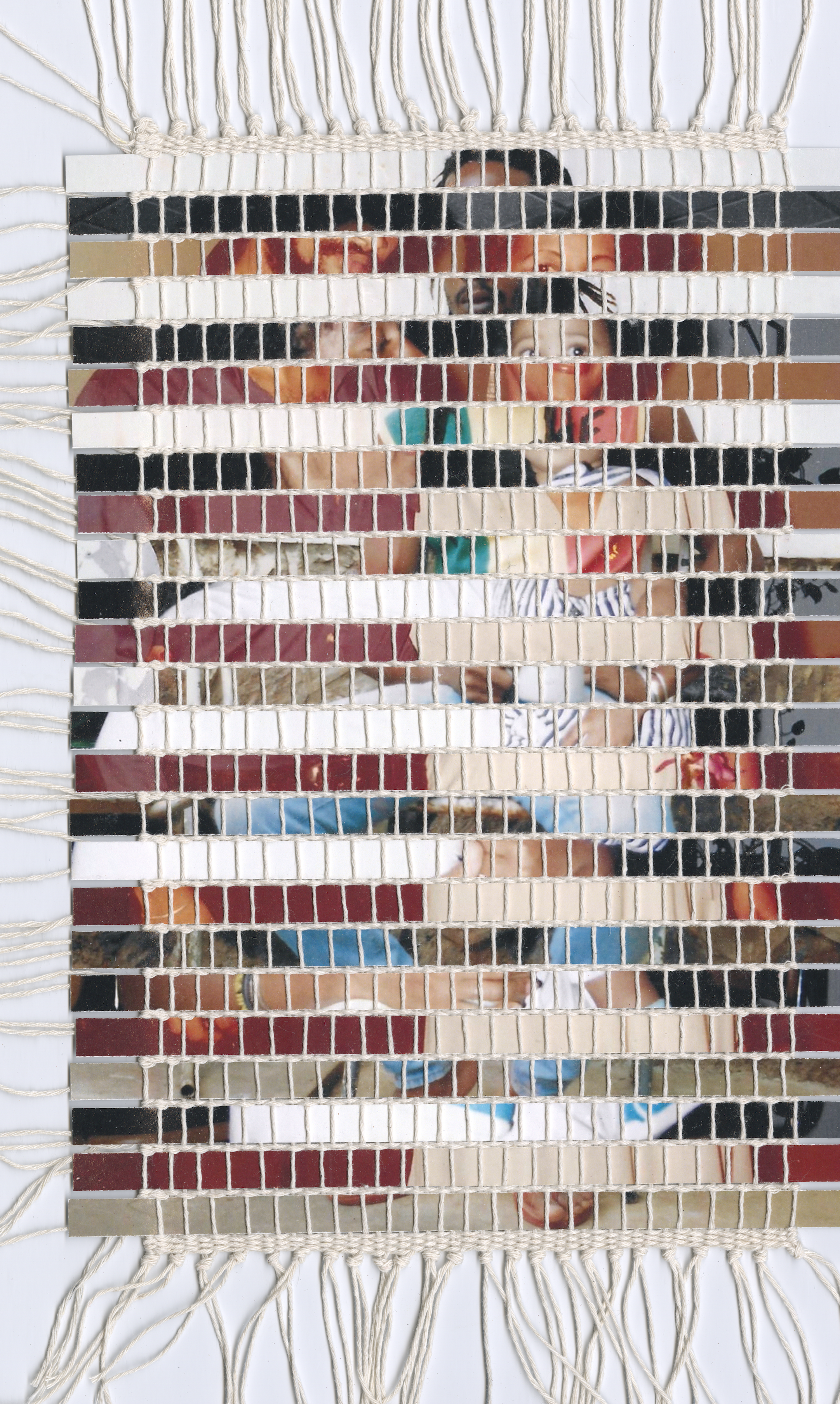 Mixed media weaving created using strips of family photographs.