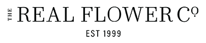 Black background with partially visible text 'REAL FLOWER CO' and 'EST 1939' beneath.