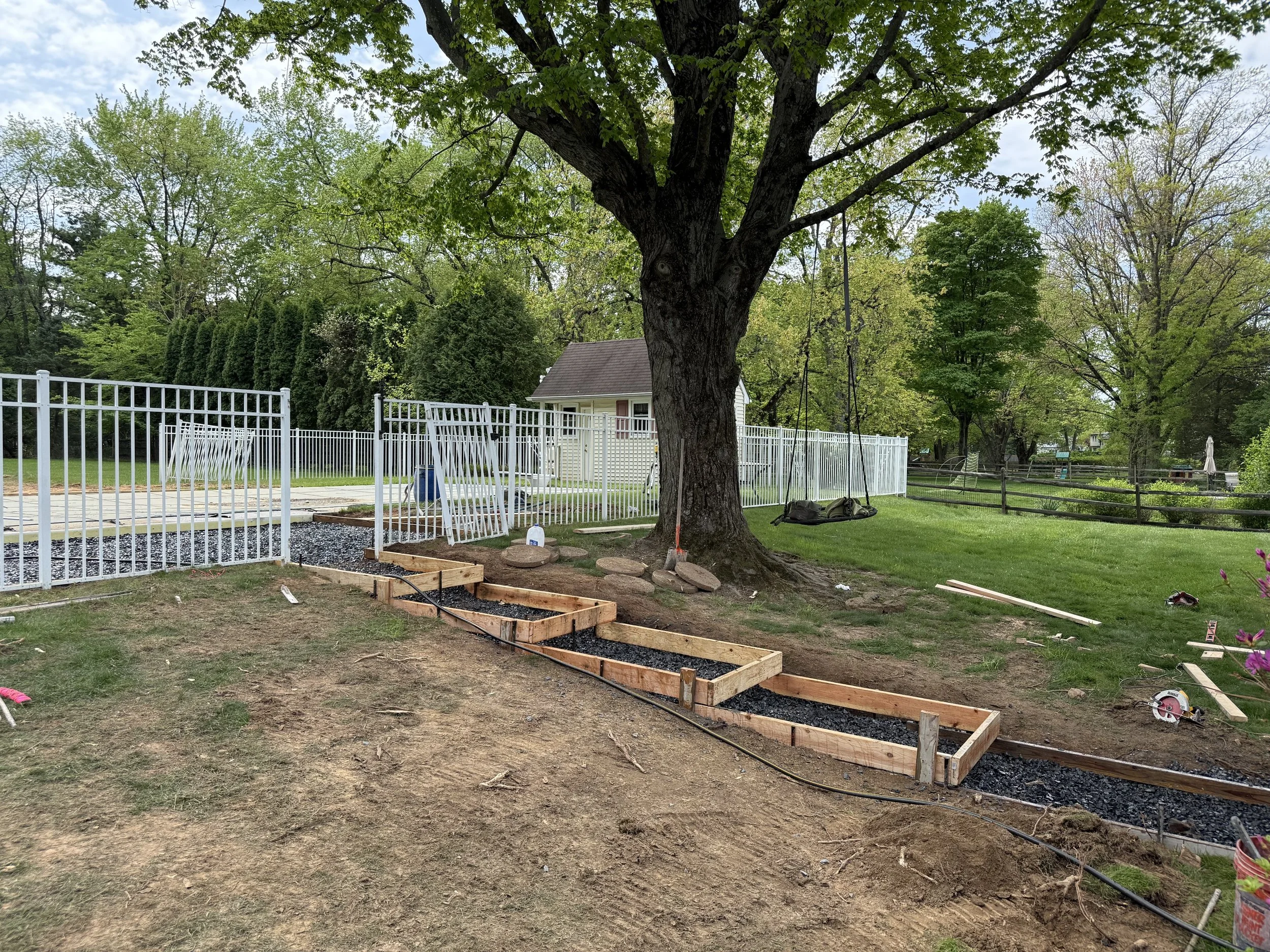 Backyard concrete steps being framed and getting ready for pouring in Marlton, New Jersey.