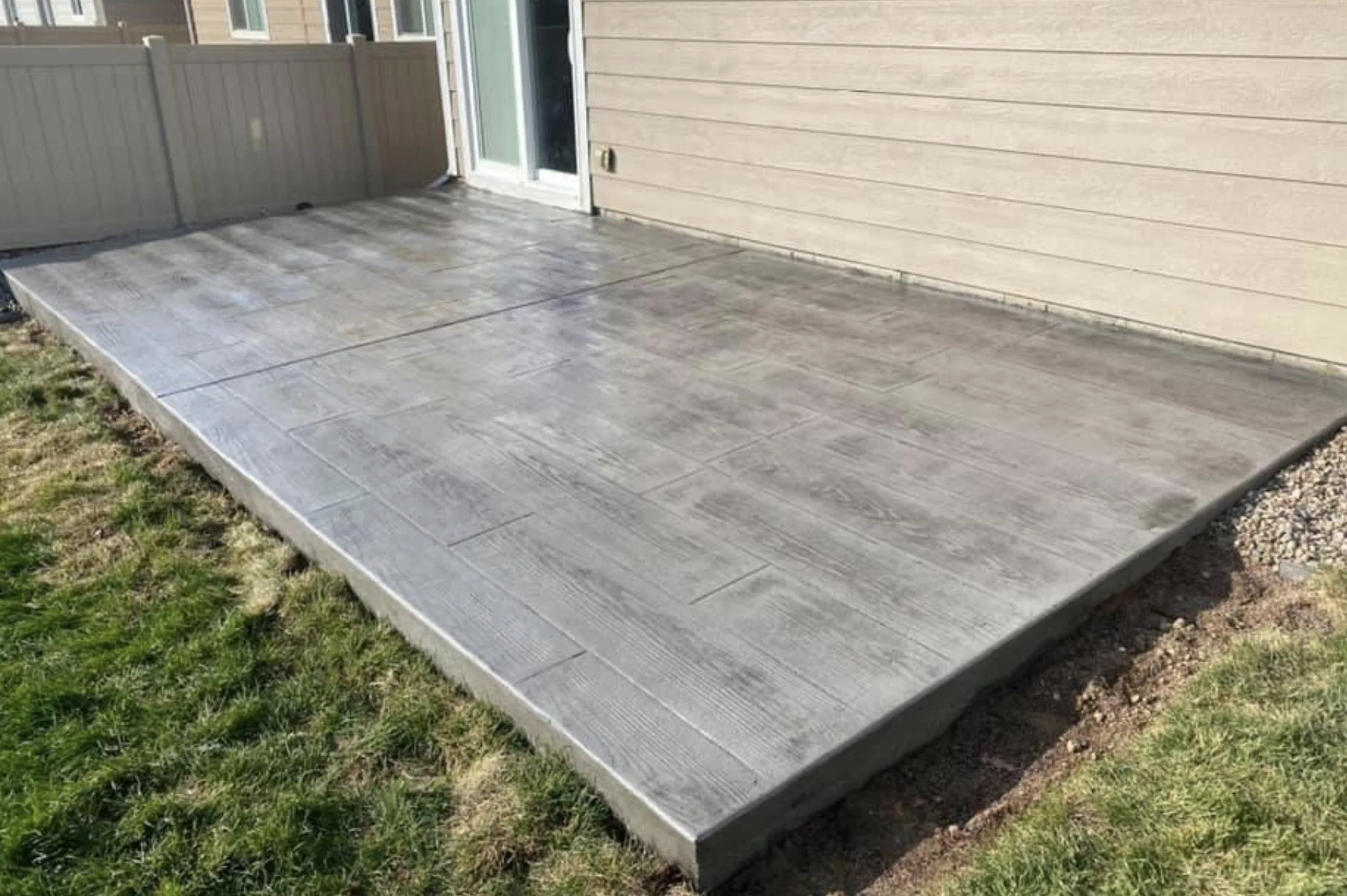 Newly installed wooden stamped concrete patio in Maple Shade, New Jersey.