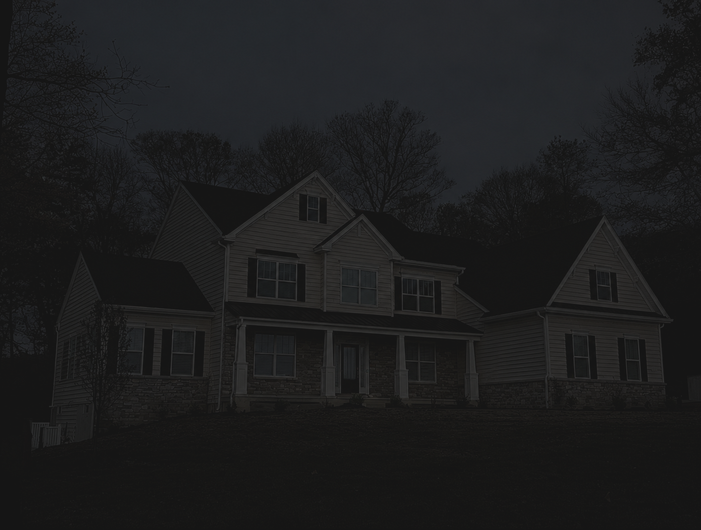 POL lighting job showing a house before landscape lighting