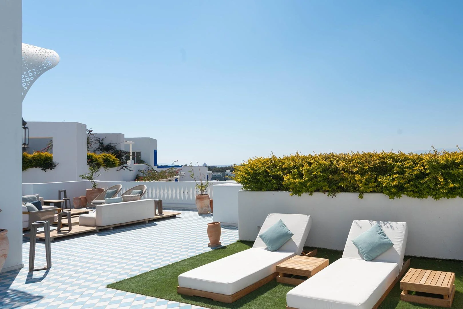 0008_RoyalGem-Cloud7-Aqaba-Residence-Luxury-Travel-Vacation-Aqaba-Jordan-Fourbedrooms-outdoor-sunbeds.jpg