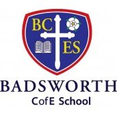 Badsworth Community School logo featuring a shield with open book and paw print