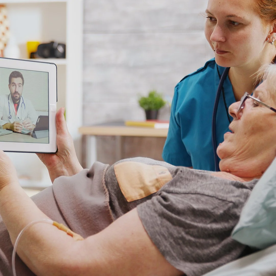 woman at home hospital caremonitor community care remote patient monitoring telehealth