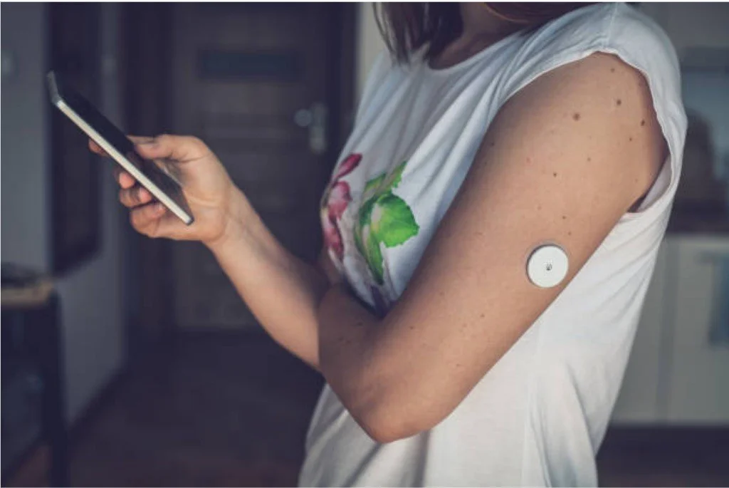 Patient using CareMonitor app to manage Diabetes