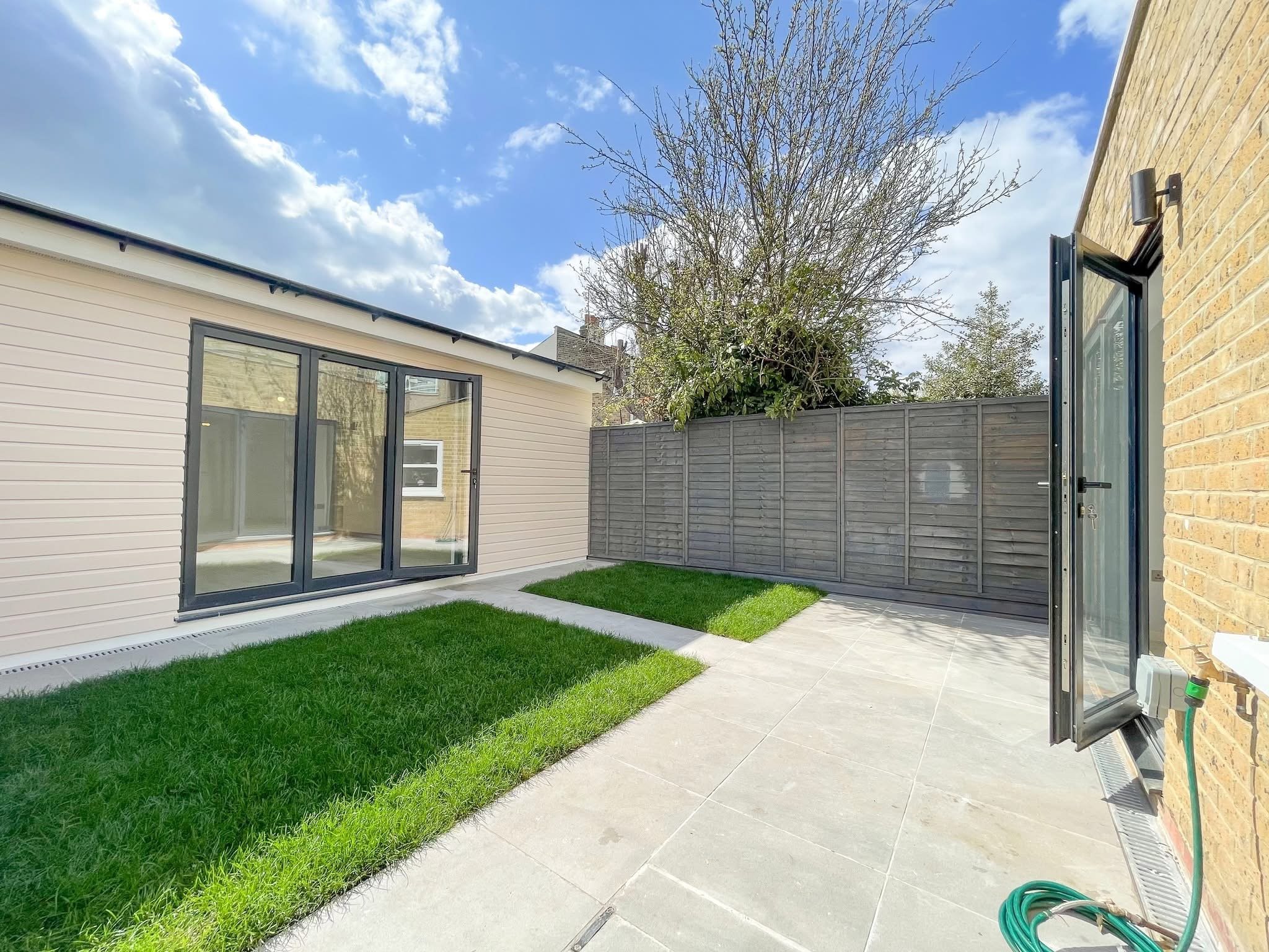 External works and extension coordination with improved outdoor space.