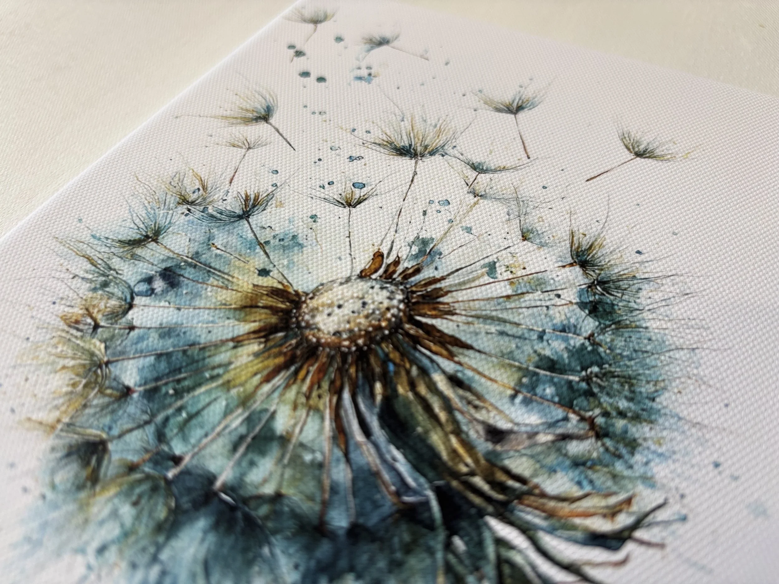 Close-up of a watercolor painting of dandelions on textured canvas.