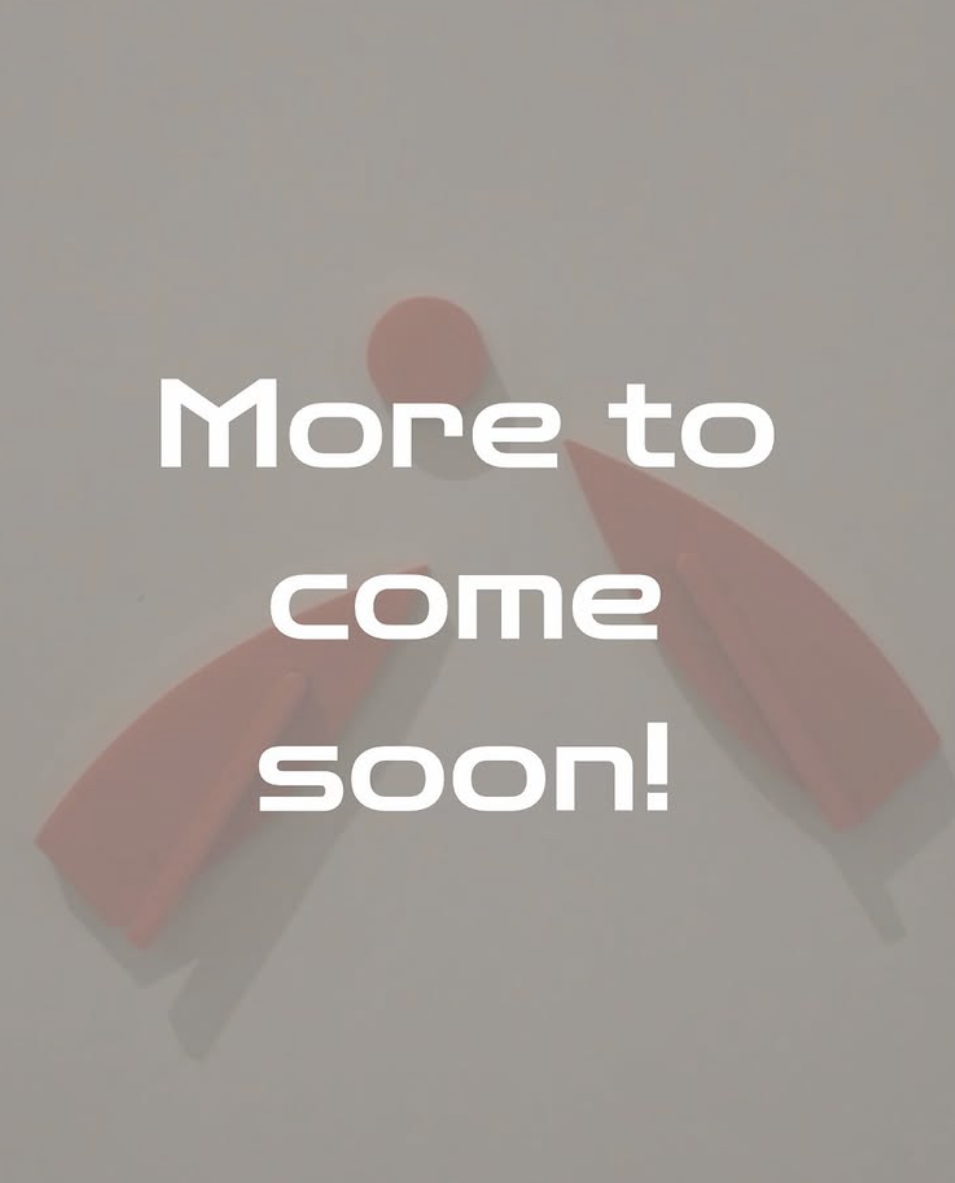 Two orange candy or lipstick containers with their caps off and a pink ball on top of one container, with the text 'More to come soon!' overlaid.