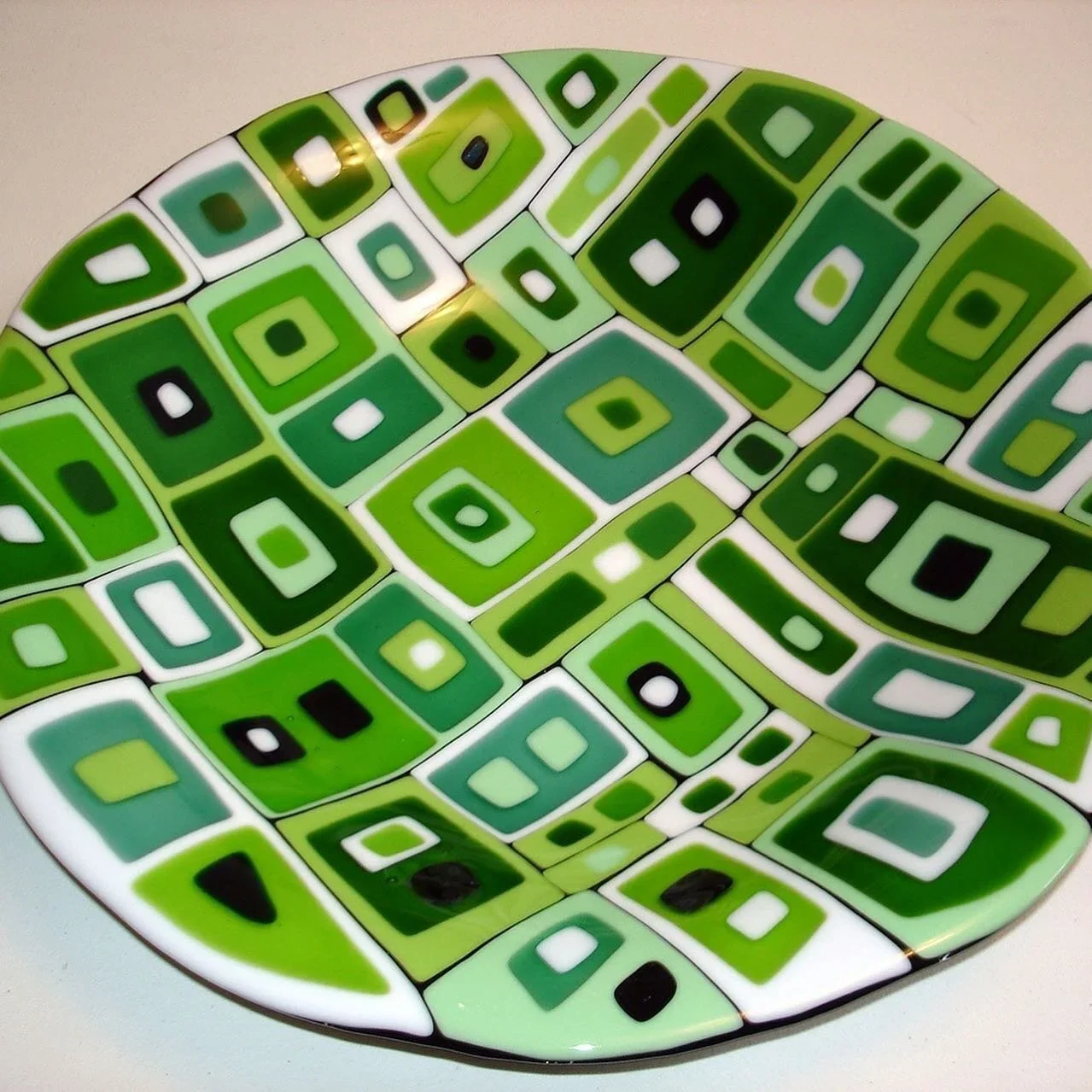 fused glass bowl with green square design