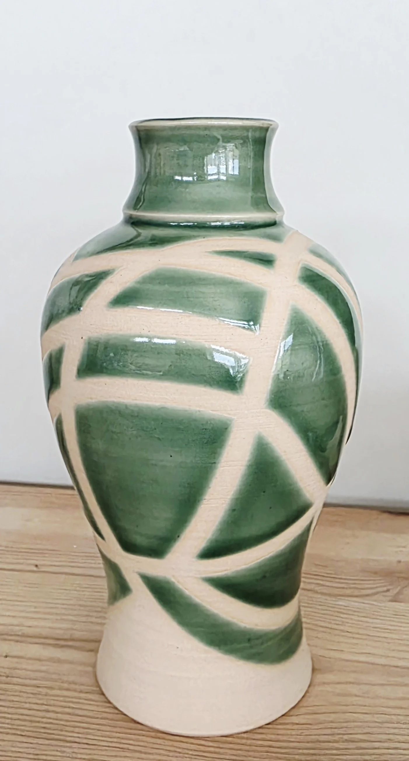 green pottery vase