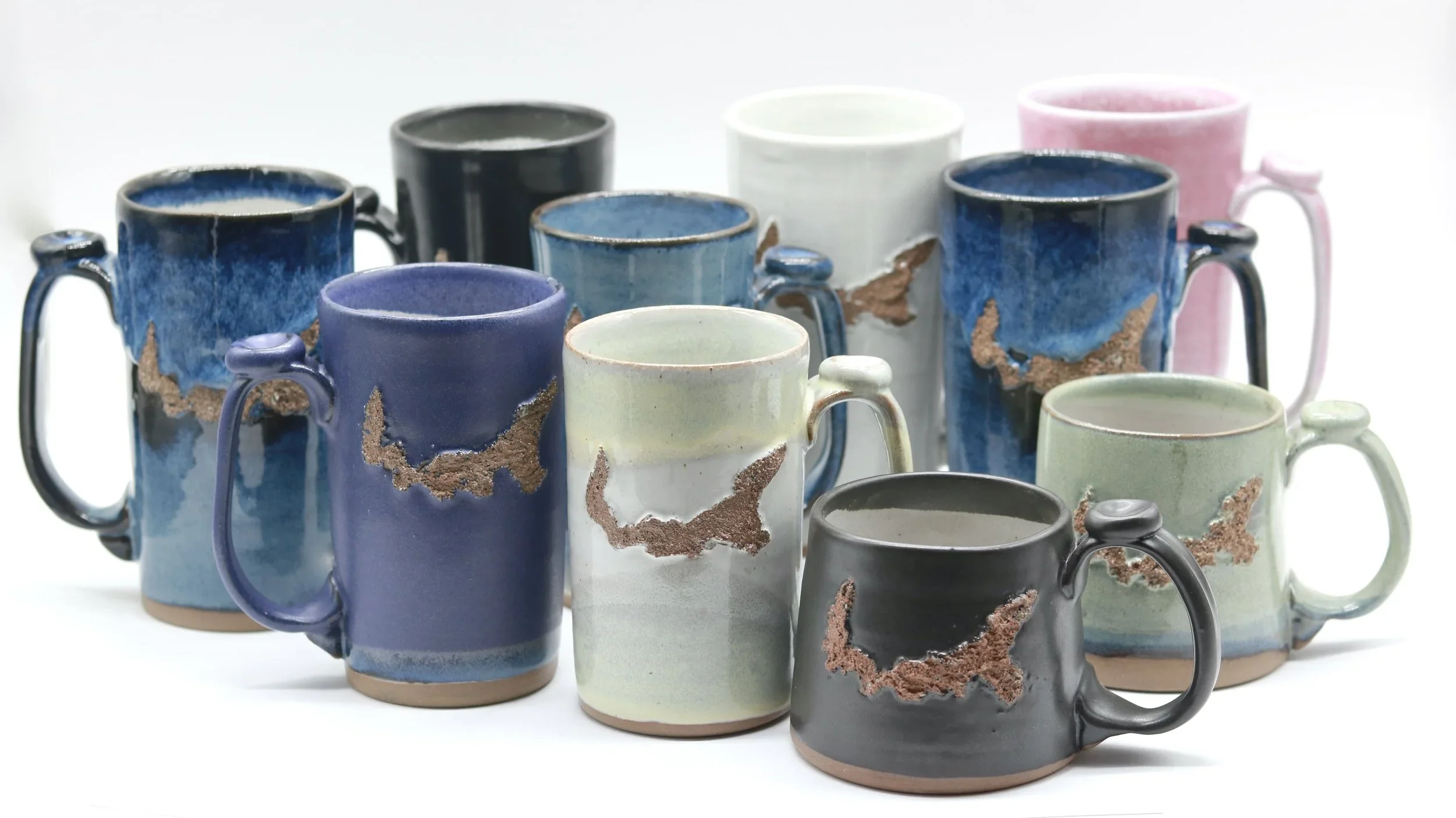 pottery mug with raised island shape
