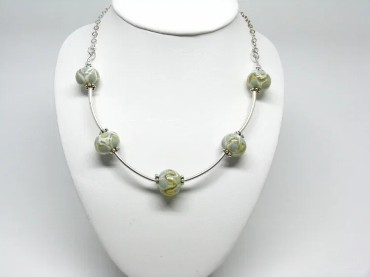 silver necklace with glass beads